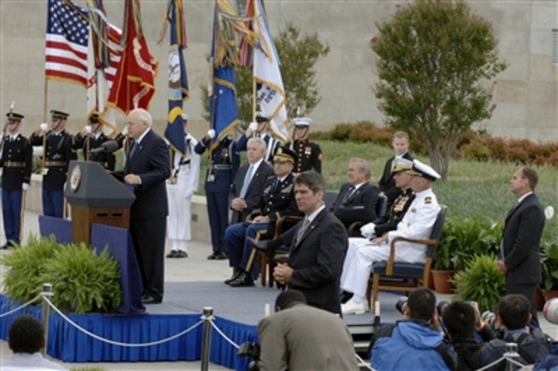 Vice President Dick Cheney addresses family members of victims of the Sept. 11, 2001, terrorist attack on the Pentagon on during the five-year observance ceremony on Sept. 11, 2006.  Seated on the dais from left to right are  Chaplain Lt. Col. William O. Barefield, U.S. Army,  Secretary of Defense Donald H. Rumsfeld, Chairman of the Joint Chiefs of Staff Gen. Peter Pace, U.S. Marine Corps and Chaplain Capt. Jonathan Frusti, U.S. Navy.  