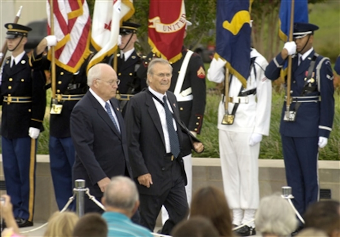 Vice President Dick Cheney (left) and Secretary of Defense Donald H. Rumsfeld arrive at the Pentagon Mall Entrance on Sept. 11, 2006, for ceremonies marking the 5th anniversary of the terrorist attack on the Pentagon.  One hundred eighty-four people died at the Pentagon on Sept. 11, 2001, when a group of terrorists hijacked American Airlines Flt. 77 and crashed it into the western face of the building.  