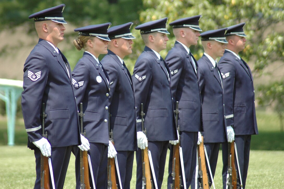 The USAF Honor Guard Firing Party firing line during a Full Honors Funeral in Arlington National Cemetery.