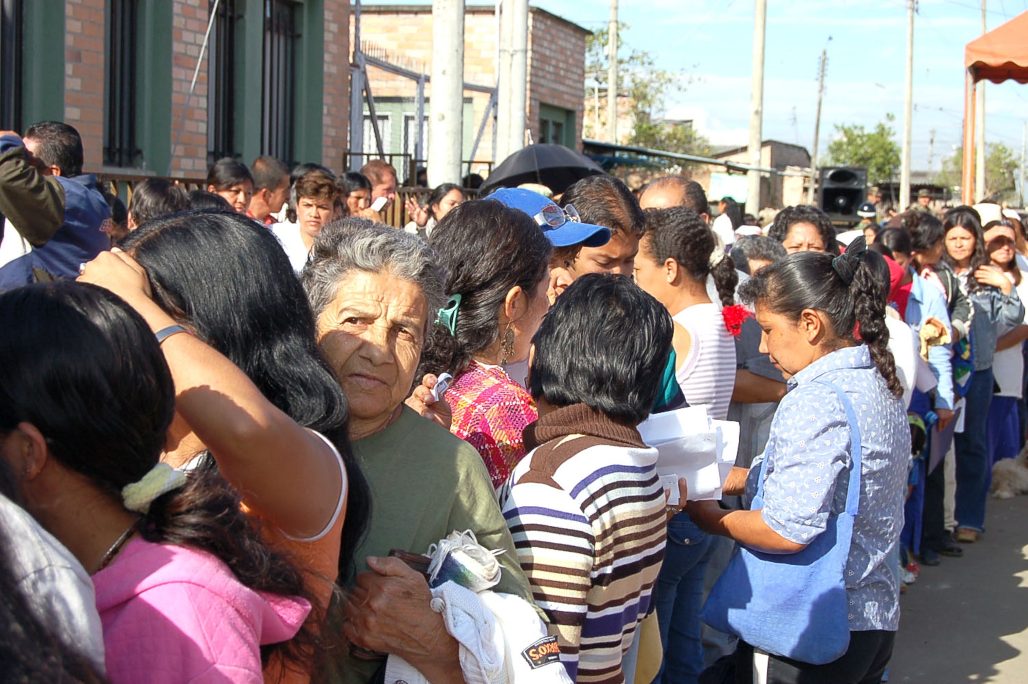 People gather outside the Hospital Toribo Maya in Popayan, Colombia, Sept. 12 to receive treatment from a U.S. medical team performing a medical readiness training exercise. (U.S. Air Force photo/Staff Sgt. Matthew Bates) 
