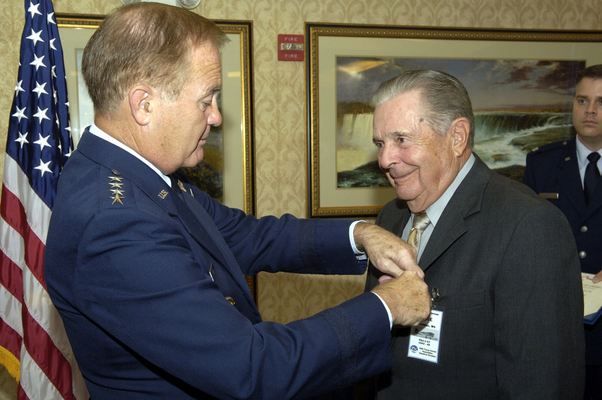 Gen. Ronald E. Keys presents Eugene Peterson a Bronze Star at a ceremony in Washington, D.C., Sept. 9. Five Bronze Stars were presented to World War II veterans. The paperwork for the medals had been misfiled and rediscovered more than 60 years later. The men were unaware they were supposed to receive the medals. General Keys is commander of Air Combat Command. (U.S. Air Force photo/Tech. Sgt. Cohen A. Young) 

