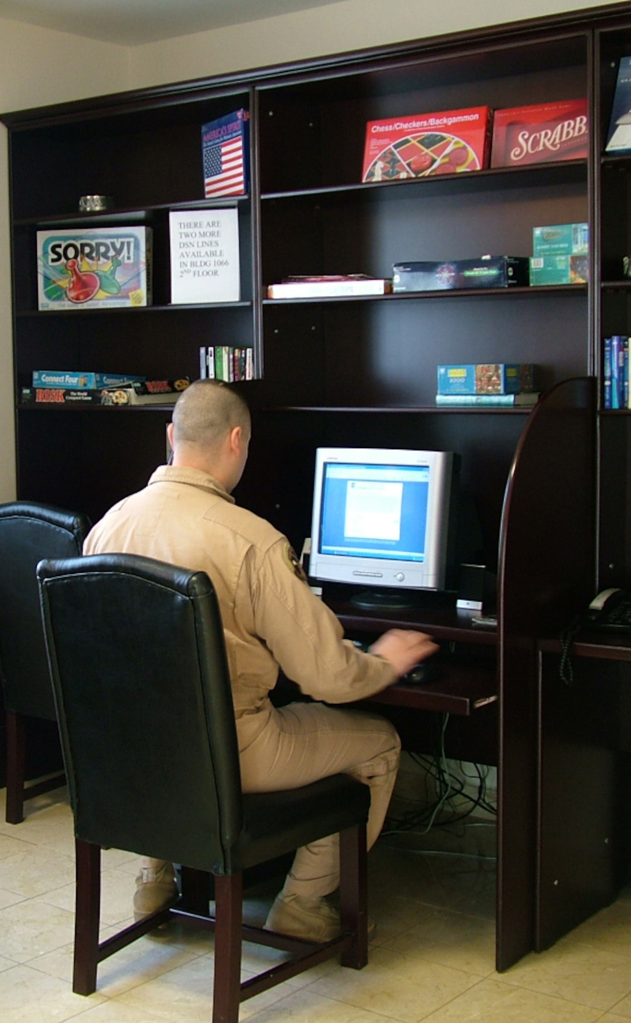 A customer uses the computer center to check out a game at the Hodja Inn. The inn won the 2006 Innkeeper Award. (Coutesy photo)
