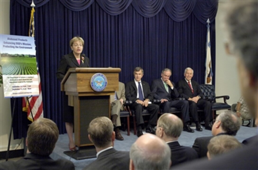 Ohio Rep. Marcy Kaptur addresses the audience assembled for the opening of a showcase of biobased products in the Pentagon on Sept. 12, 2006.  She was joined on stage (left to right) by exhibit host Deputy Secretary of Defense Gordon England (obscured), Secretary of Agriculture Mike Johanns, Iowa Sen. Tom Harkin and Indiana Sen. Richard Lugar.  Products being displayed by the thirty-seven American companies represented include lubricants and fuels, industrial cleaning products and degreasers, paint, clothing and insulation materials as well as such items as ink toner and cafeteria flatware.  