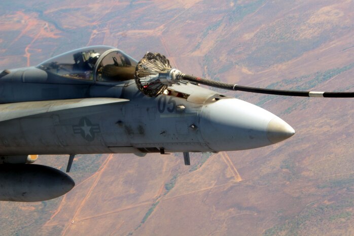 A KC-130 from Marine Aerial Refueler Transport Squadron 152 refuels an F/A-18C from Marine Fighter Attack Squadron 212 during Exercise Southern Frontier, Sept. 14. During the training mission the KC-130 provided 11,000 pounds of fuel to four F/A-18C Hornets.