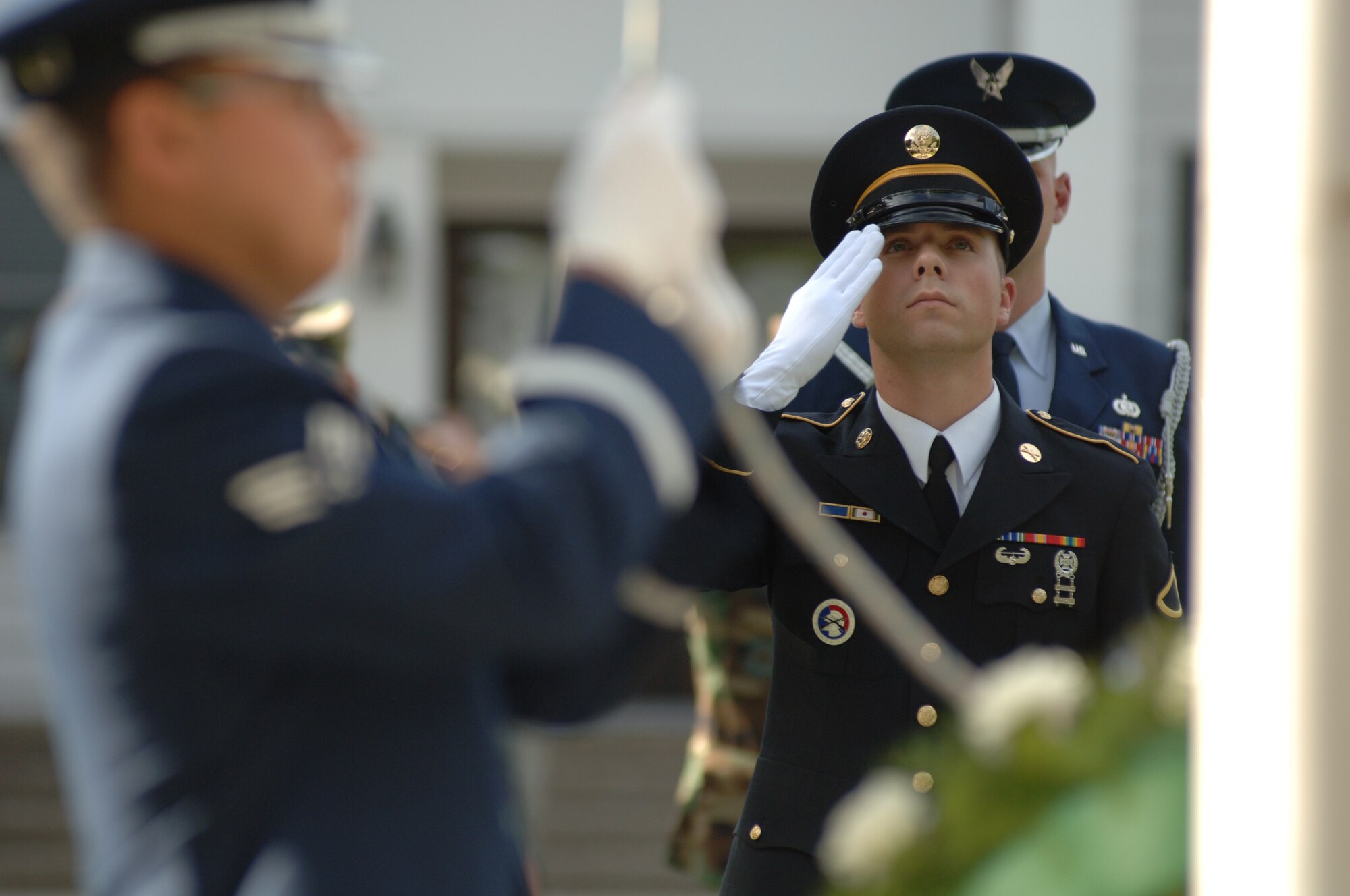 Members of the Fairchild honor guard perform a retreat ceremony. Also at the event was a bagpiper who played “Amazing Grace” and Chaplain (Maj.) Kevin Constantine who offered a prayer. (U.S. Air Force photo/Senior Airman Jessica Fuentez)
