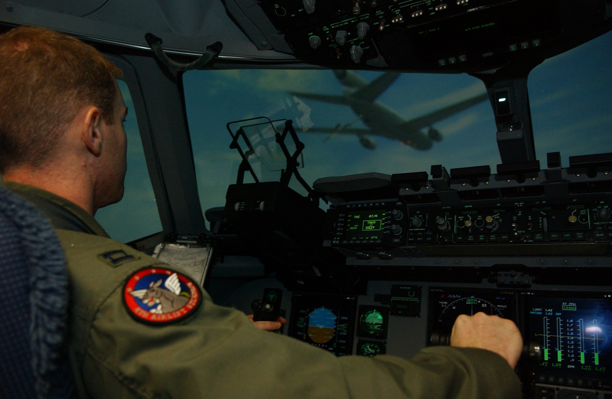 MCCHORD AIR FORCE BASE, Wash. --
Capt. Kevin Marmillion, 4th Airlift Squadron, prepares to rendezvous with a KC-10 Extender during a simulated air refueling mission.
(U.S. Air Force photo by Abner Guzman)
