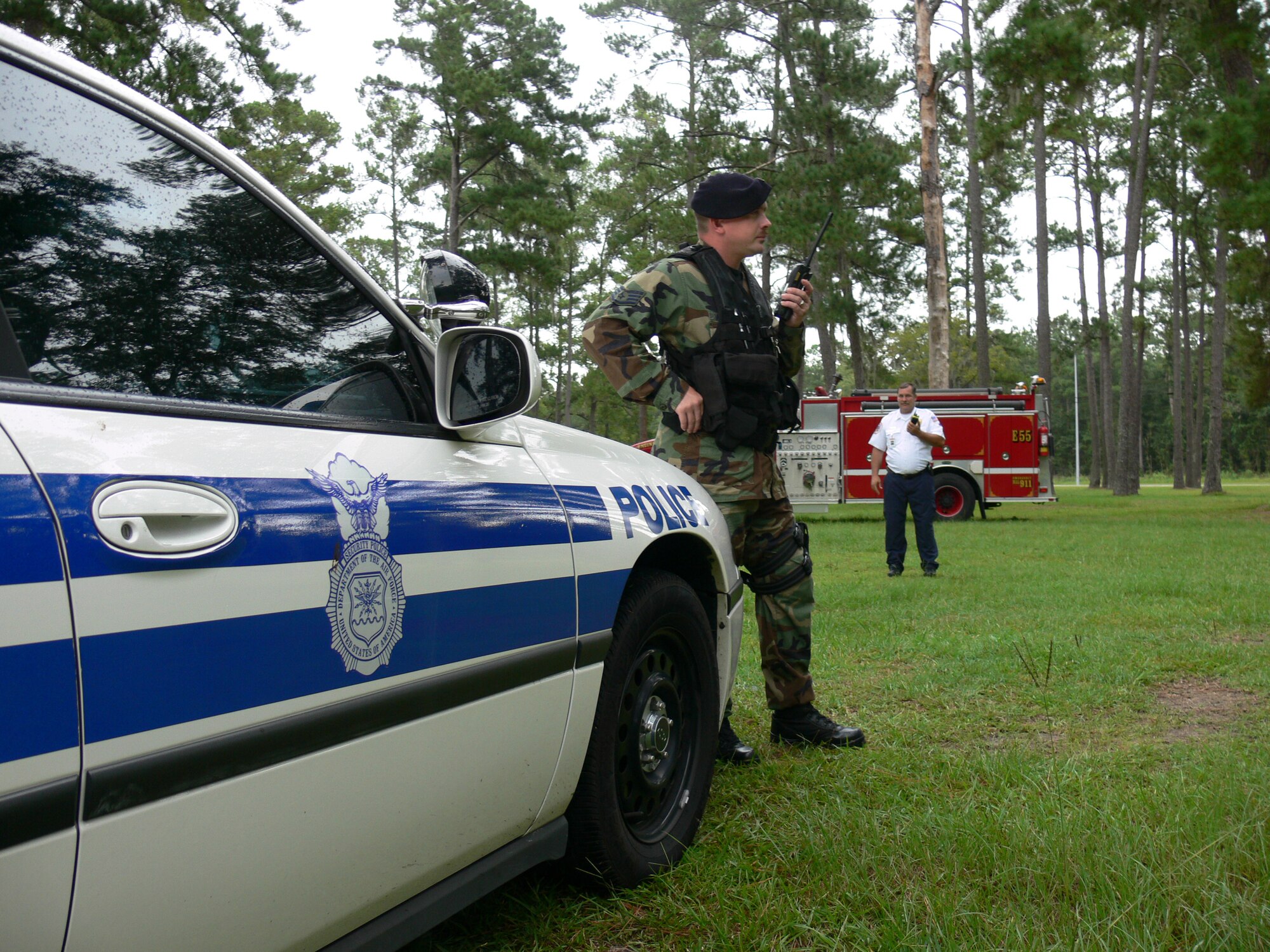 Staff Sgt. Kevin Whitlock, 347th Security Forces Squadron day shift flight sergeant, checks the new emergency network Mutual Aid with Gerald Lunger, Lowndes County Fire Department fire chief. Mutual Aid allows Moody to have better communication abilities with all the local area’s first responders. (Photo by Senior Airman S.I. Fielder)