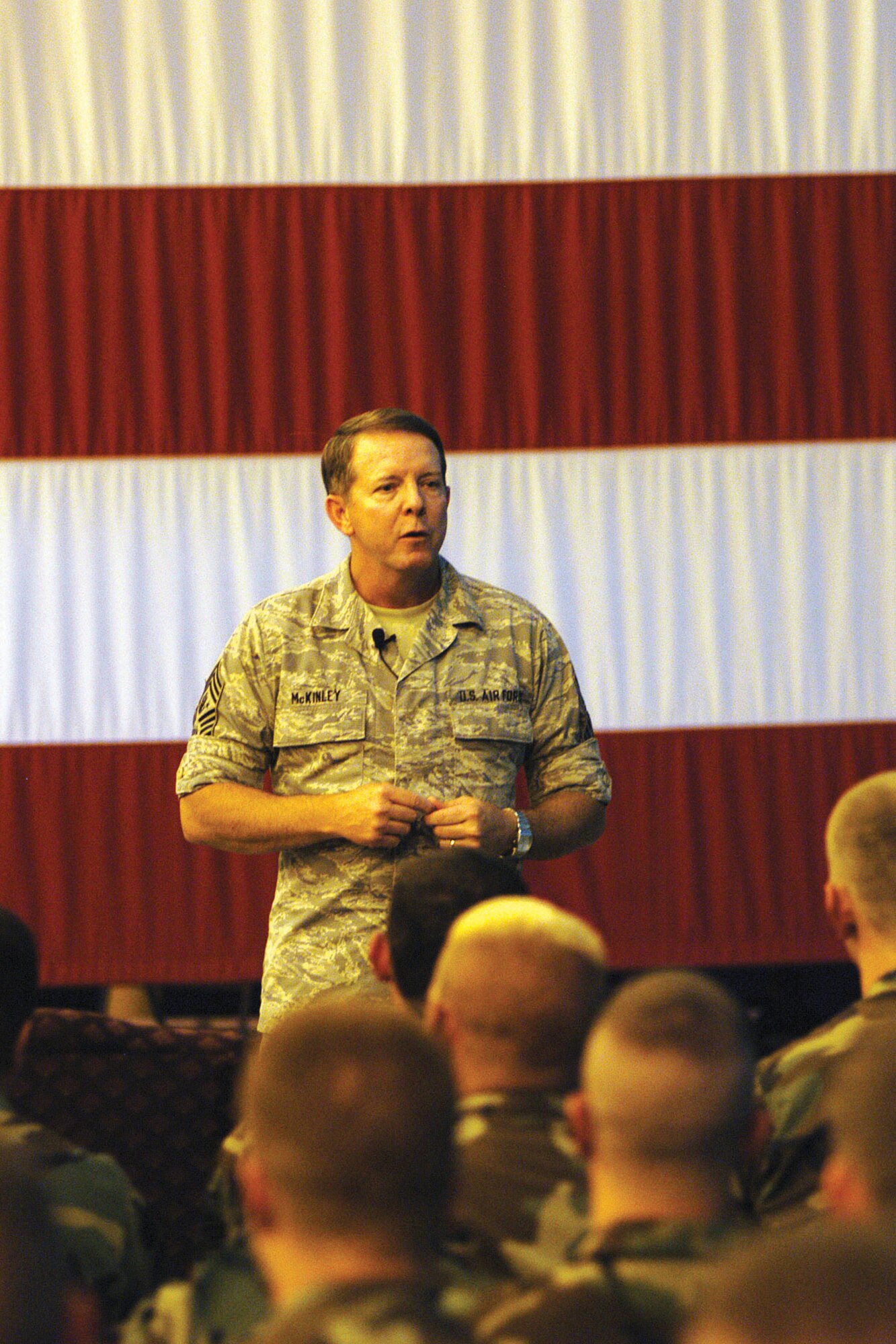 Chief Master Sgt. of the Air Force Rodney J. McKinley addresses Airmen at an enlisted call at Offutt Air Force Base, Neb., Sept. 7. Chief McKinley spoke about the promotion of Airman pride and the issues he plans to focus on during his tenure as the Air Force's top enlisted member. (U.S. Air Force photo)