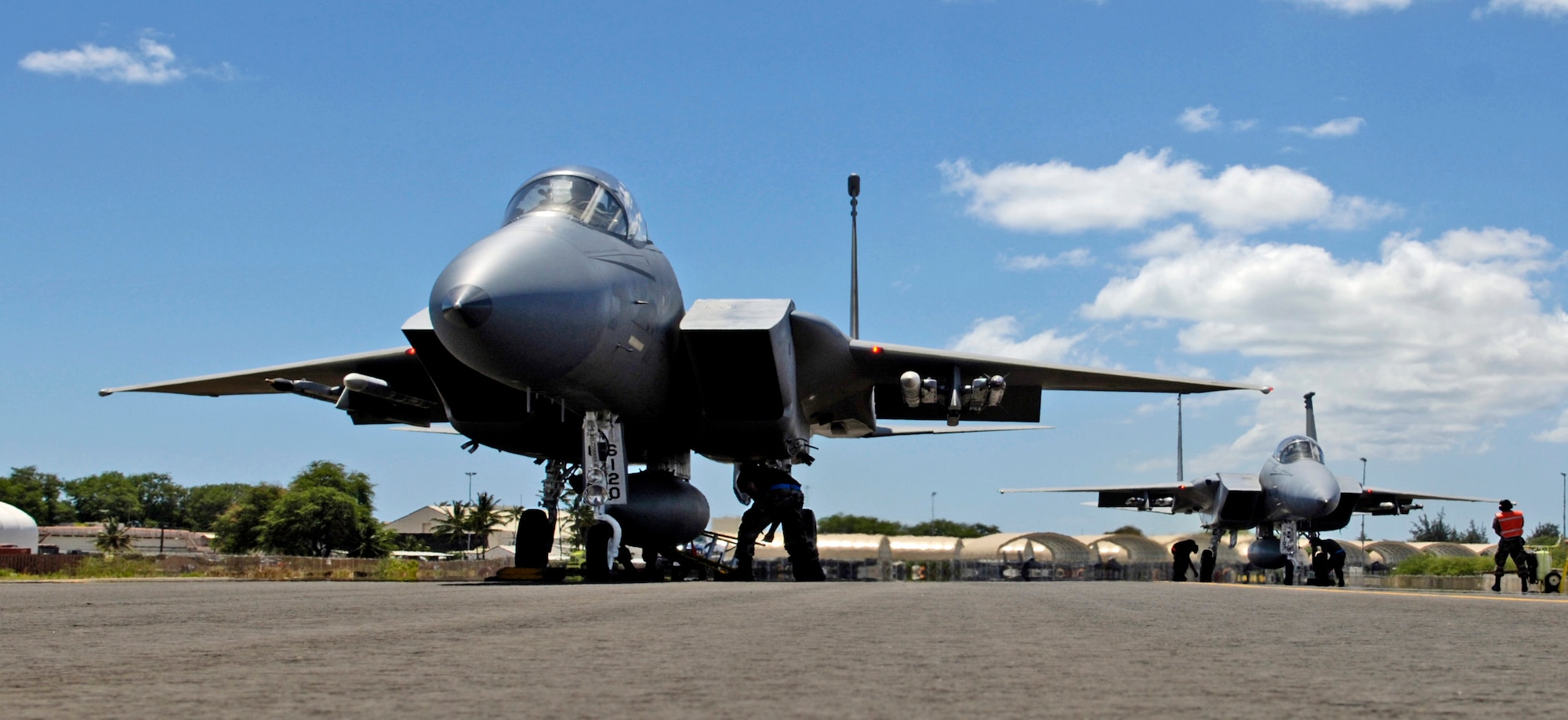 F-15 Eagles get a last minute check before taking off from Hickam Air Force Base, Hawaii Sept. 8, 2006 during Exercise Sentry Aloha. The F-15’s are from the Hawaii Air National Guard’s 199th Fighter Squadron. The Texas Air National Guard’s 149th Fighter Wing brought six F-16 Fighting Falcons to the exercise which brings dissimilar combat assets to train at Hickam. (U.S. Air Force photo/ Tech. Sgt. Shane A. Cuomo)