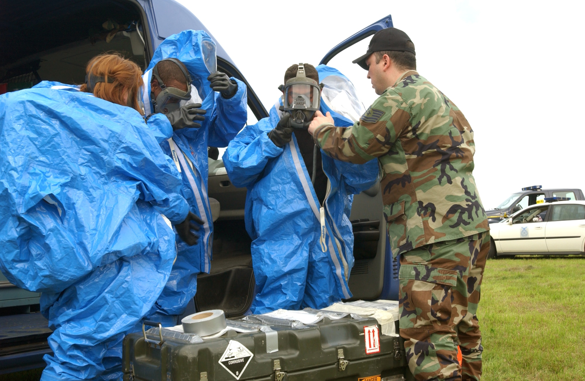 Crash and recovery Airmen from the 52nd Fighter Wing at Spangdahlem Air Base, Germany, suit up before begining assessment of an F-16 Fighting Falcon crash site. The F-16 crashed near the town of Oberkail. The pilot safely ejected from the aircraft. (U.S. Air Force photo/Airman Emily Moore) 