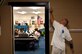 Tech. Sgt. Tracy Duplantis, 1st Combat Camera Squadron volunteers for United Way by painting the halls of the Rollings Middle School of the Arts Monday. (U.S. Air Force photo/Staff Sgt. Stacy Pearsall)