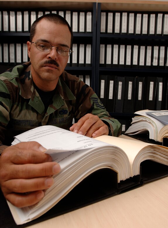 Technical Sergeant Bradly Schoffstall of the First Fighter Wing TODO, reviewing technical orders on Langley Air Force Base Virginia, September 13, 2006.(US Air Force photo by Airman First Class Christopher L. Ingersoll)(Released)