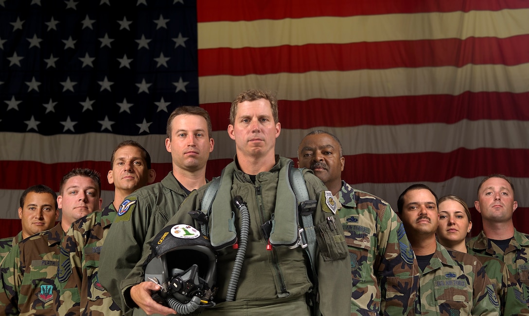 On September 11, 2001 America was faced with a day of days. Terrorist attacks on the World Trade Center and The Pentagon sent a jolting shock through the hearts of all Americans.Five years ago, aircraft maintainers  like Technical Sgt. Christopher Plath, Master Sgt Stephen Crawford, and Senior Master Sgt Robert Schacht (left)at a moments notice,crewed F-16's to be flown by North Dakota Air National Guard pilots like Maj Craig Borgsprom (left center). F-15 maintainers like Chief Master Sgt Charles Forest, Technical Sgt Brad Schoffstall, and Staff Sgt Rick Brady (right) also helped scramble fighters from Langley AFB on that dreadful day. Staff Sgt Rachel Pais (right), a medical technician with the 1st Medical Operations Squadron deployed to Maquire AFB to assist with casualties from the World Trade Center.Colonel Thomas Bergeson (center), 1st Operations Group Commander and Commander of the 71st Fighter Squadron on Sept 11,2001, Flew missions over the heart land of America. These Air Force members are the faces of Langley AFB five years later.(USAF Photo By Staff Sgt Samuel Rogers)