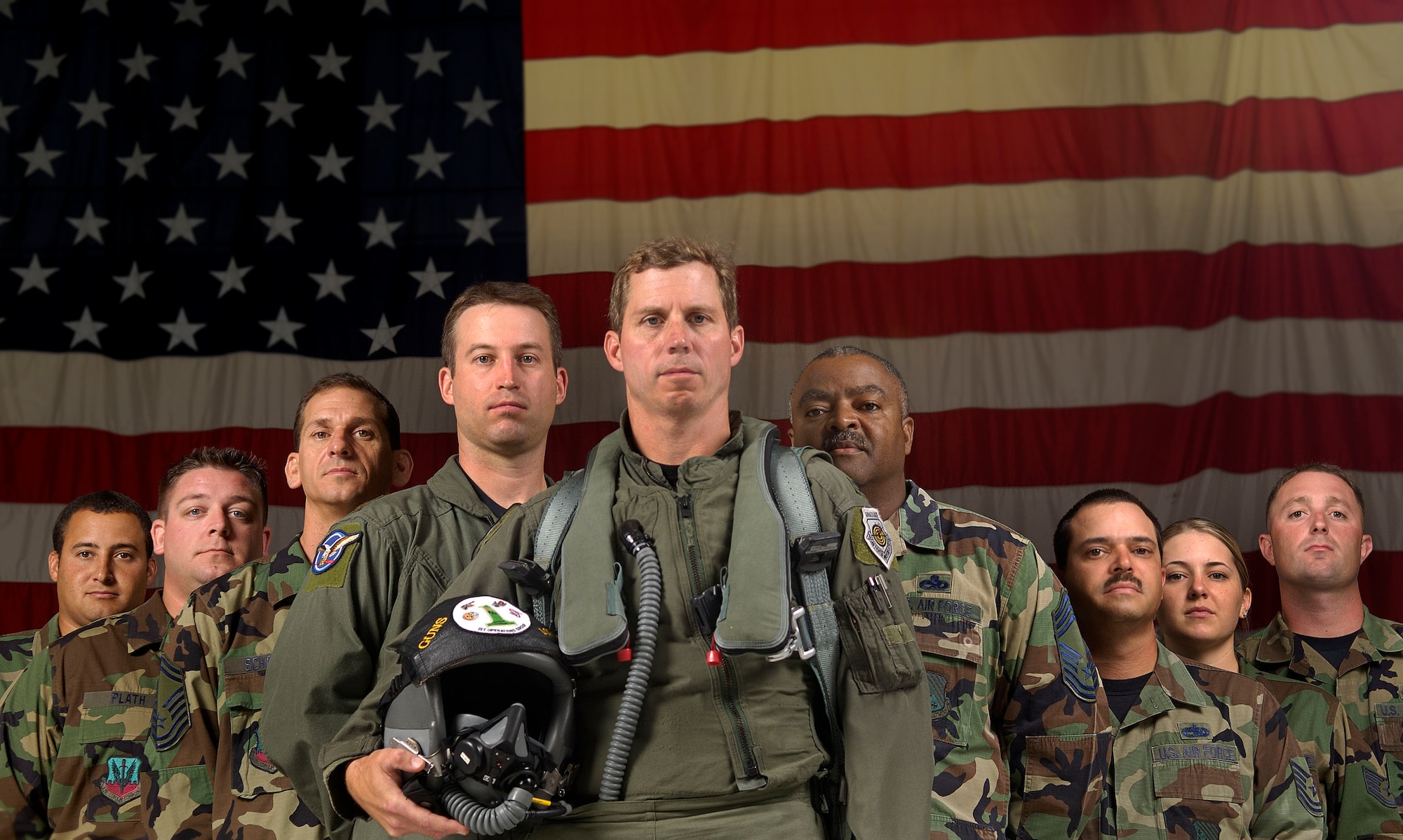 On September 11, 2001 America was faced with a day of days. Terrorist attacks on the World Trade Center and The Pentagon sent a jolting shock through the hearts of all Americans.Five years ago, aircraft maintainers  like Technical Sgt. Christopher Plath, Master Sgt Stephen Crawford, and Senior Master Sgt Robert Schacht (left)at a moments notice,crewed F-16's to be flown by North Dakota Air National Guard pilots like Maj Craig Borgsprom (left center). F-15 maintainers like Chief Master Sgt Charles Forest, Technical Sgt Brad Schoffstall, and Staff Sgt Rick Brady (right) also helped scramble fighters from Langley AFB on that dreadful day. Staff Sgt Rachel Pais (right), a medical technician with the 1st Medical Operations Squadron deployed to Maquire AFB to assist with casualties from the World Trade Center.Colonel Thomas Bergeson (center), 1st Operations Group Commander and Commander of the 71st Fighter Squadron on Sept 11,2001, Flew missions over the heart land of America. These Air Force members are the faces of Langley AFB five years later.(USAF Photo By Staff Sgt Samuel Rogers)