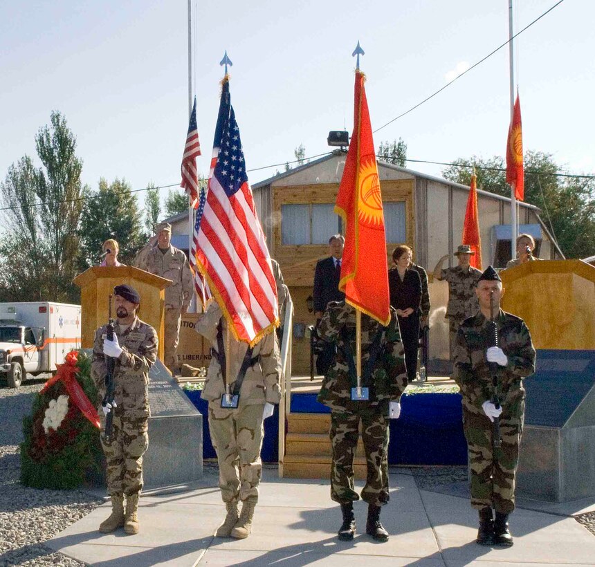 Members from the 376th Air Expeditionary Wing, Kyrgyz, Spanish and French militaries perform color guard duties during a remembrance ceremony at Manas Air Base, Kyrgyzstan, Sept. 11. (U.S. Air Force photo/Jim Westfall)