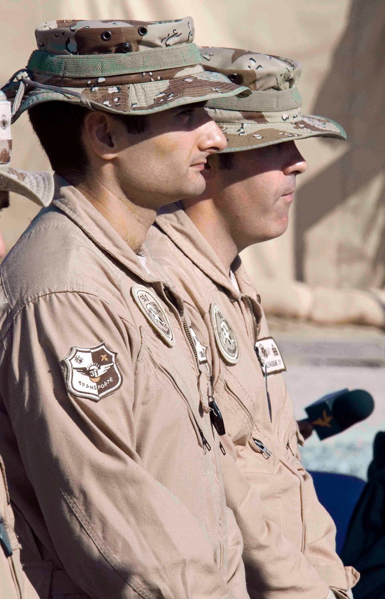 Members of the Spanish detachment at Manas Air Base, Kyrgyzstan, take a moment to reflect during a remembrance ceremony Sept. 11. Members from the 376th Air Expeditionary Wing, French and Kyrgyz militaries also participated in the event. (U.S. Air Force photo/Jim Westfall)