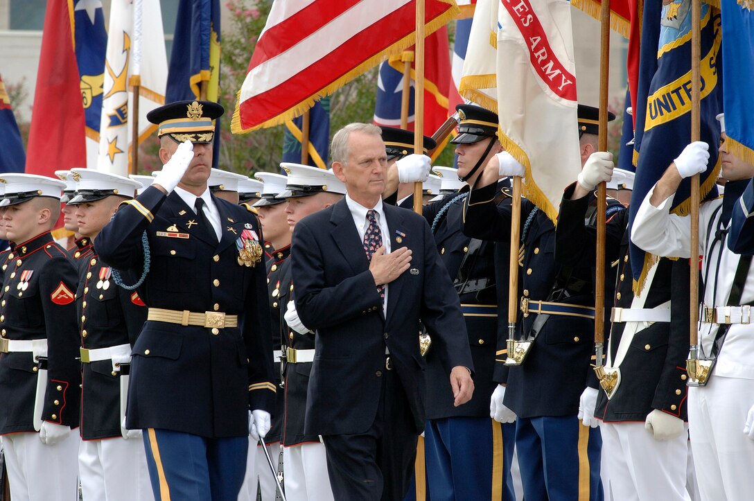The Third U.S. Infantry Regimental Commander, The Old Guard, Army Col. Robert Pricone escorts Congressman Rob Simmons (R-CT) as he inspects the troops during a POW/MIA Recognitin Day ceremony at the Pentagon, Sept. 15, 2006.  Deputy Secretary of Defense Gordon England and Chairman Joint Chiefs of Staff Marine Gen. Peter Pace hosted the event.