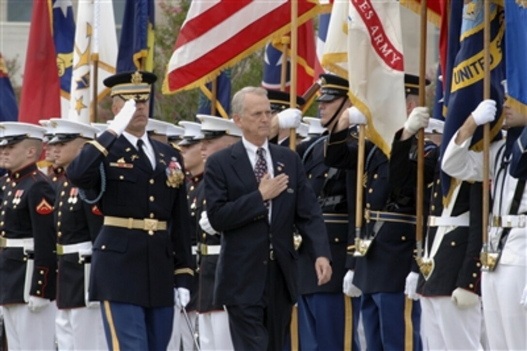 The Third U.S. Infantry Regimental Commander Army Col. Robert Pricone escorts Congressman Rob Simmons as he inspects the troops at the Pentagon during POW/MIA Recognition Day ceremonies on Sept. 15, 2006.  Deputy Secretary of Defense Gordon England and Chairman Joint Chiefs of Staff Gen. Peter Pace, U.S. Marine Corps, hosted and Congressman Simmons was the guest speaker.  