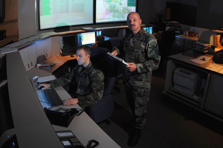 Master Sgt. Robert Potter stands in the center of the 91st Space Wing?s Missile Operations Center at Minot Air Force Base, N.D., on Sept. 18.  Sergeant Potter is the superintendent of the maintenance operations flight. (U.S. Air Force photo/Staff Sgt. Joe Laws)