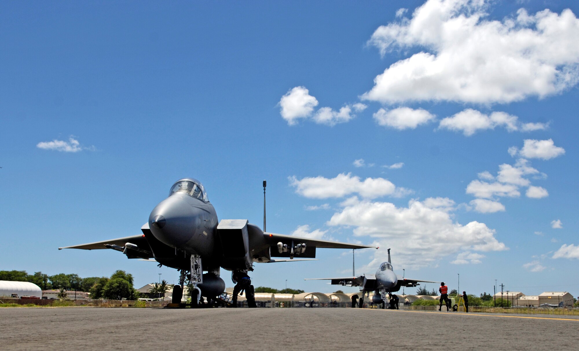 F-15 Eagles get a last-minute check before taking off from Hickam Air Force Base, Hawaii, Sept. 8 during Exercise Sentry Aloha. The F-15s are from the Hawaii Air National Guard's 199th Fighter Squadron. (U.S. Air Force photo/Tech. Sgt. Shane A. Cuomo)