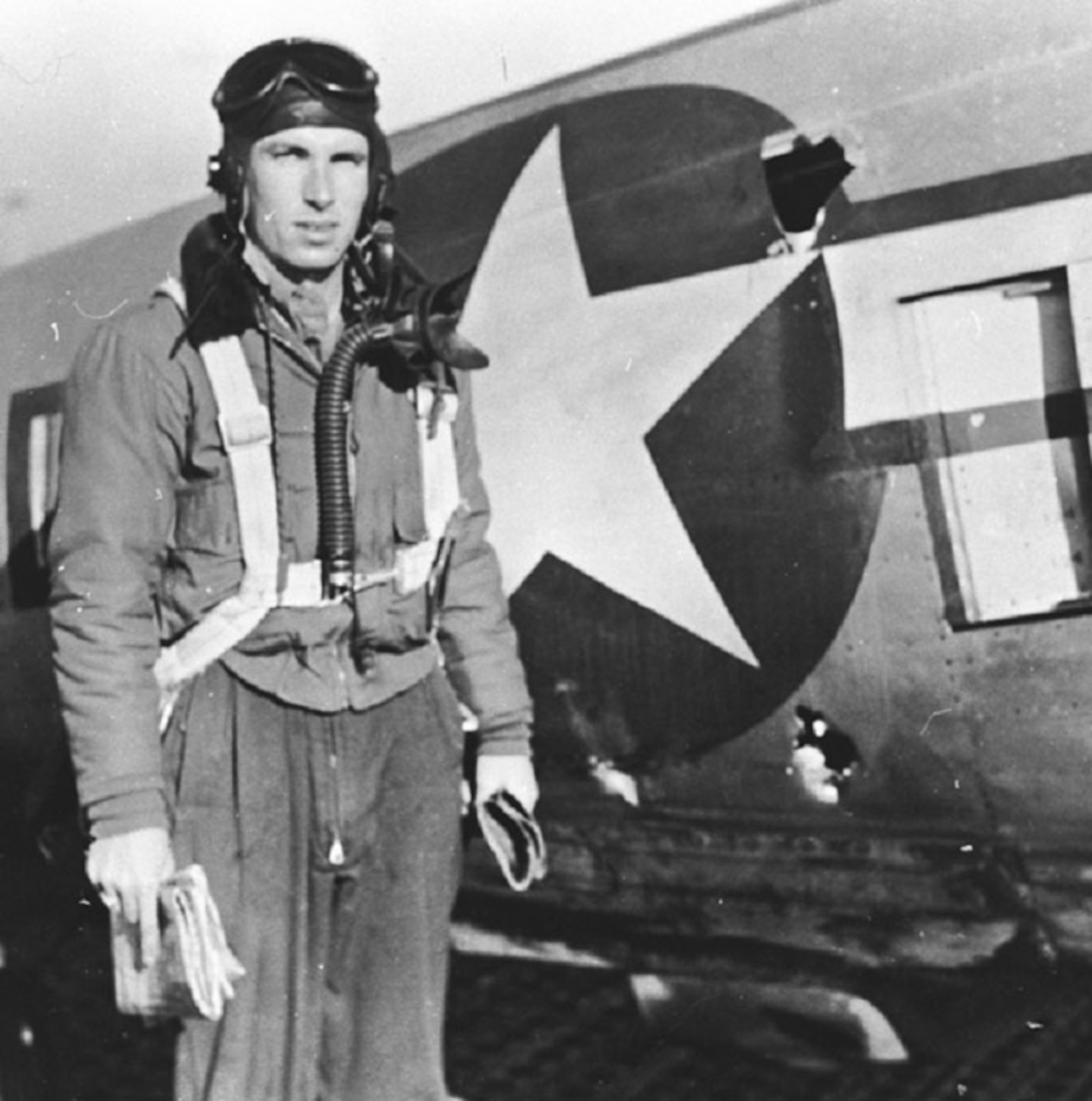 1Lt. Raymond L. Knight showing combat damage from a mission he had just flown. (U.S. Air Force photo)