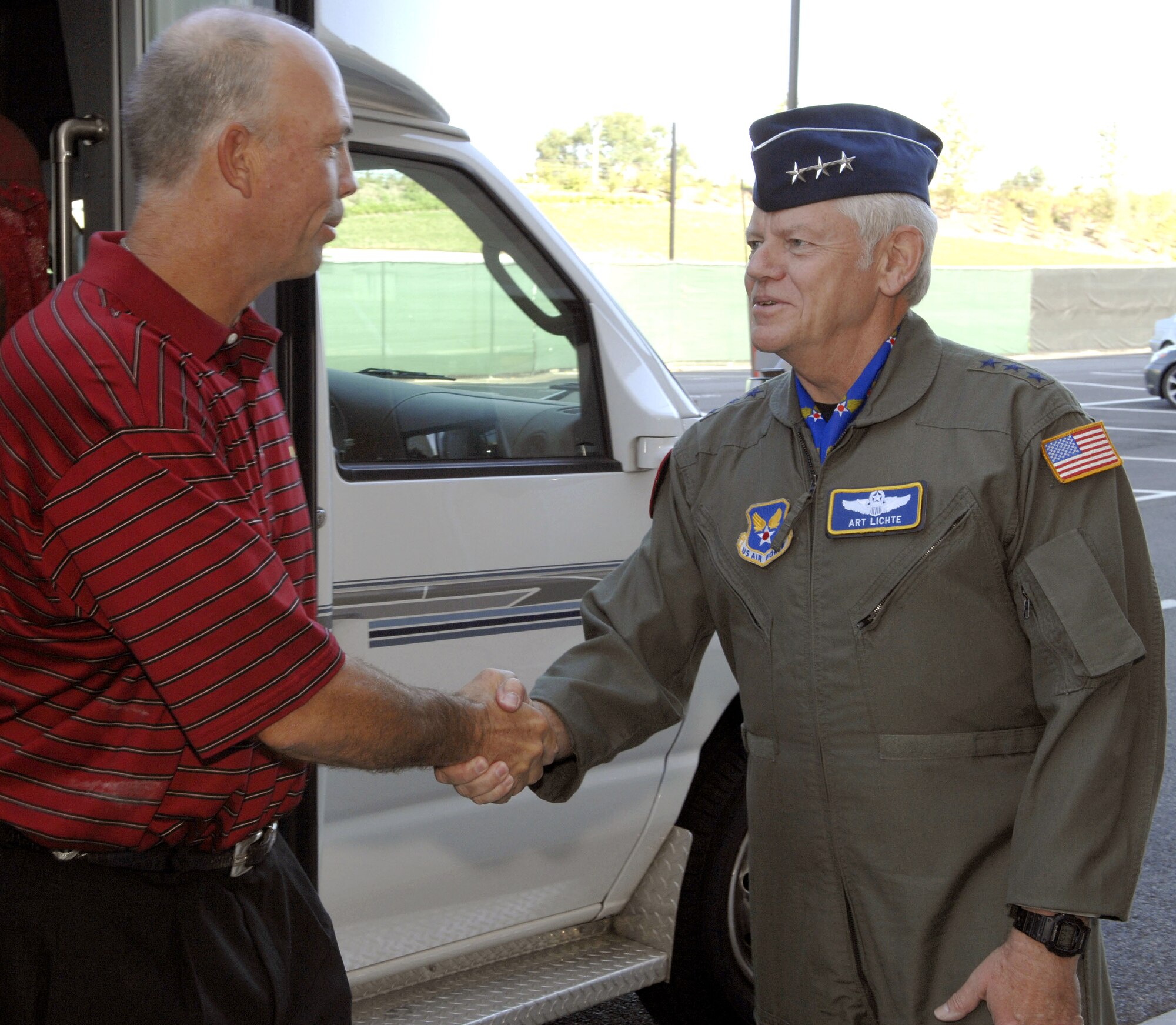 U.S. Ryder Cup Captain Tom Lehman shakes hands with Lt. Gen. Arthur J. Lichte as he arrives at the Pentagon Sept. 17. General Lichte is the assistant vice chief of staff and director, Air Force staff, Headquarters U.S. Air Force. (U.S. Air Force photo/Tech. Sgt. Cohen A. Young)