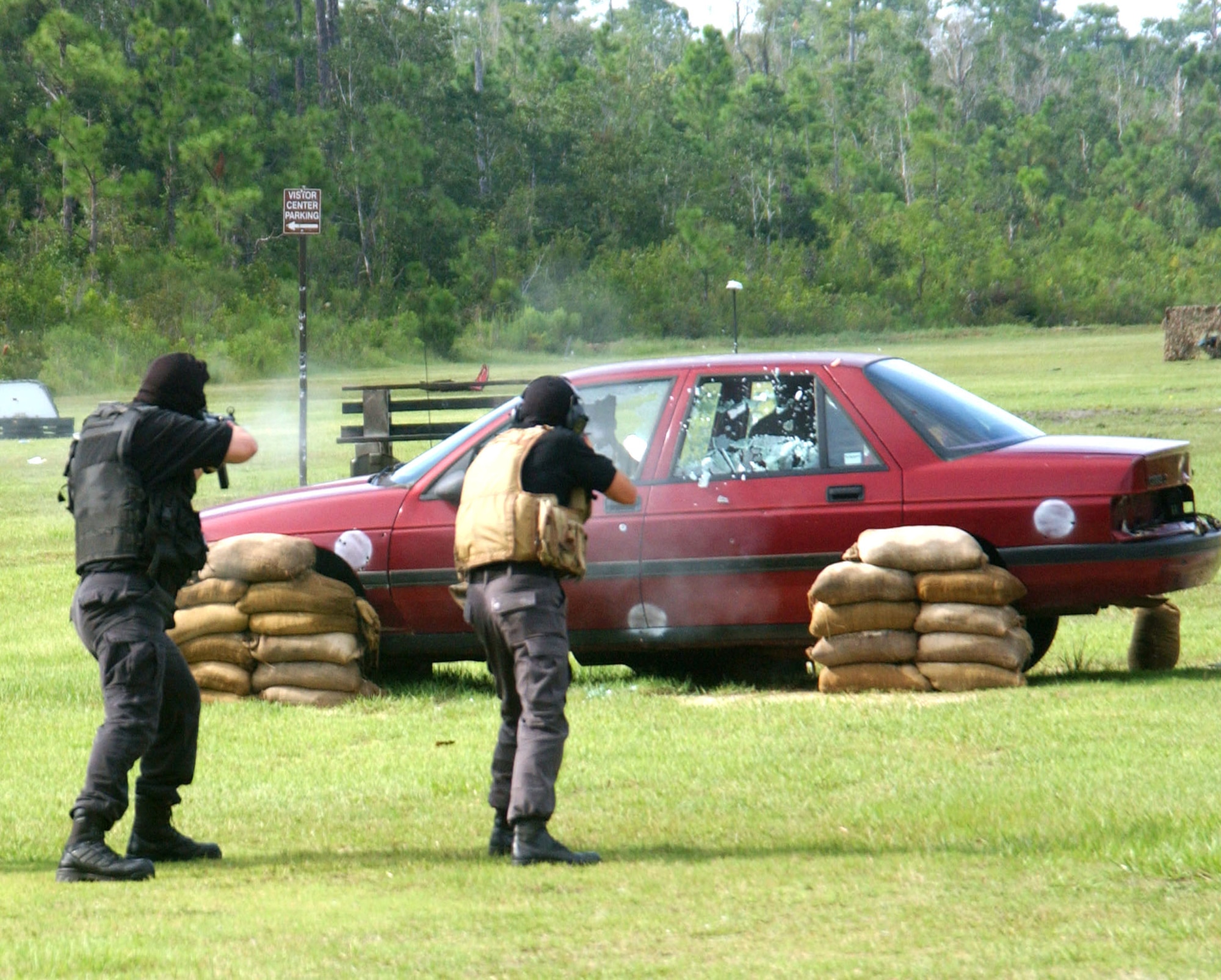 Instructors from the U.S. Air Force Special Operations School's Dynamics of International Terrorism course at Hurlburt Field, Fla., demonstrate terrorist ambush techniques to students Sept. 13. The course offers students a basic awareness of the motivation, capabilities and threat posed by terrorist groups. (U.S. Air Force photo/Chief Master Sgt. Gary Emery)
