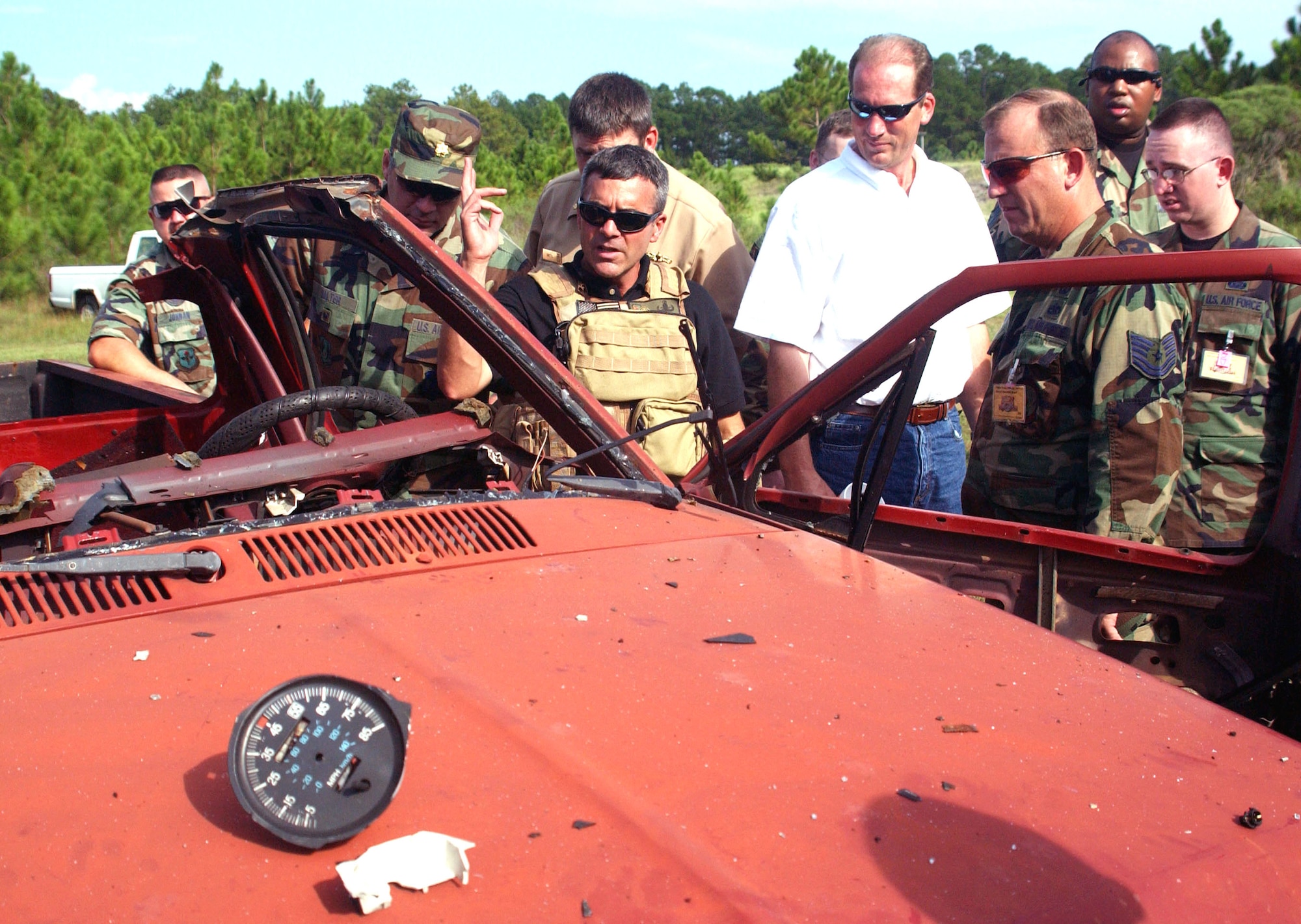 Master Sgt. Justin Anderson shows students the results of a vehicle bomb during training Sept. 13 at Hurlburt Field, Fla. Sergeant Anderson is an instructor at the U.S. Air Force Special Operations School's Dynamics of International Terrorism course, which offers students a basic awareness of the motivation, capabilities and threat posed by terrorist groups. (U.S. Air Force photo/Chief Master Sgt. Gary Emery) 
