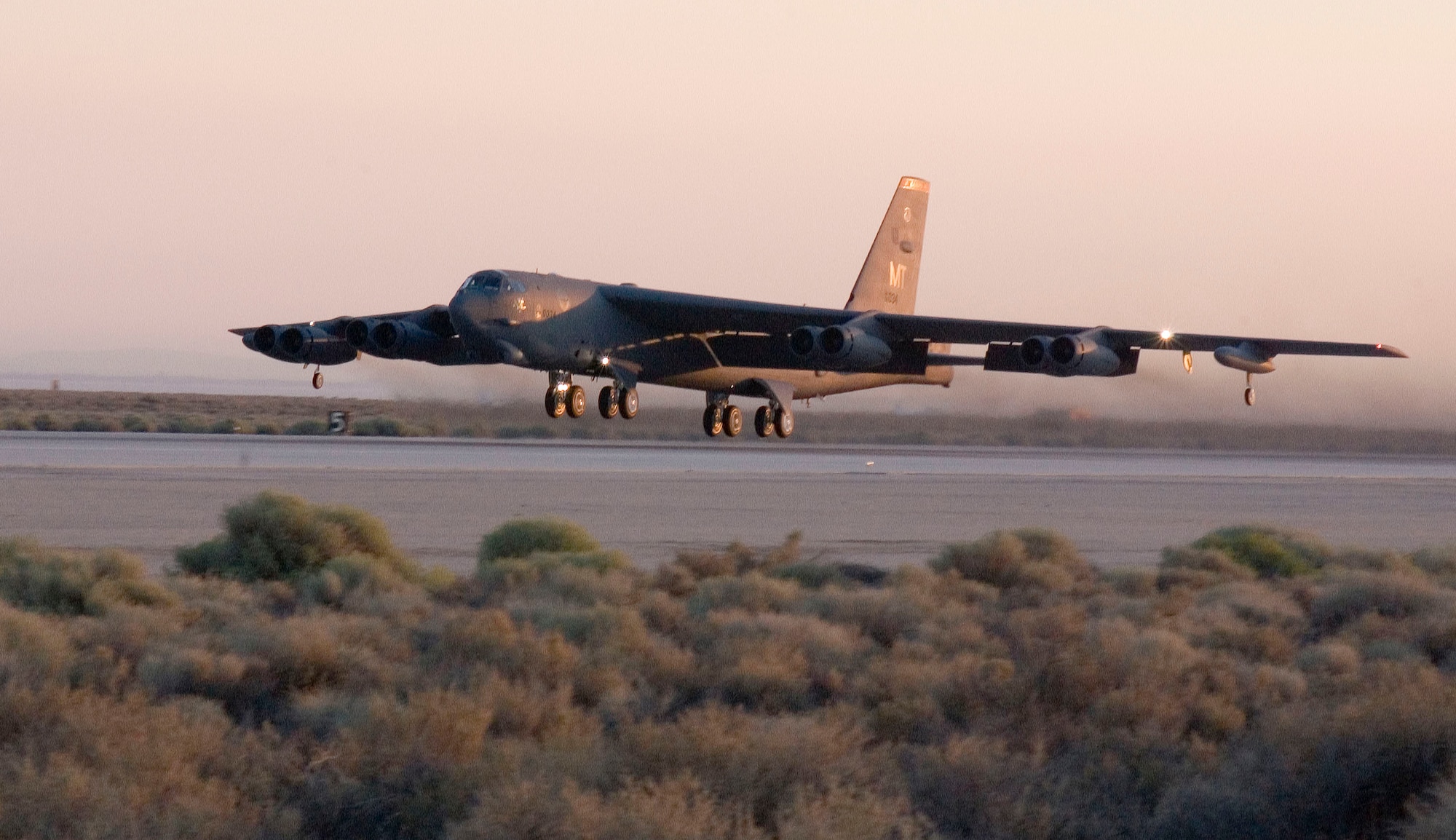 A B-52 Stratofortress takes off from Runway 22 during a Fischer-Tropsch test flight from Edwards Air Force Base, Calif., on Sept. 19. During the flight, two of the aircraft's eight engines ran on the natural gas-based Fischer-Tropsch fuel blend. The bombers are from the 5th Bomb Wing at Minot Air Force Base, N.D. (U.S. Air Force photo/Chad Bellay)