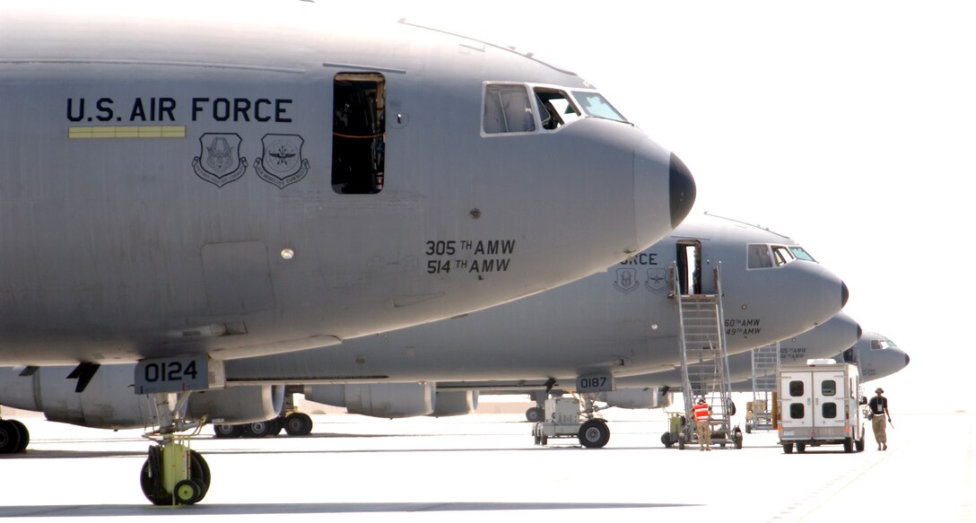 Maintenance Airmen work on the flightline at a forward-operating base in Southwest Asia Sept. 19. This location is home to the 380th Air Expeditionary Wing, the largest air refueling squadron in the theater of operations that includes KC-10 Extenders and KC-135 Stratotankers. (U.S. Air Force photo/Master Sgt. Jason Tudor)
