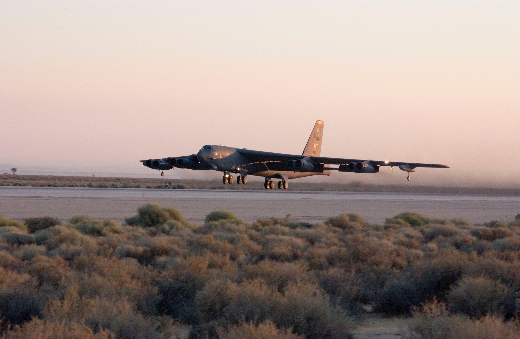 EDWARDS AIR FORCE BASE, Calif. — A B-52 takes off from runway 22 here during a Fischer-Tropsch demonstration flight Sept. 19. Two of the aircraft’s eight engines ran on the natural gas-based Fischer-Tropsch fuel blend during the test flight. (Air Force photo by Chad Bellay)

