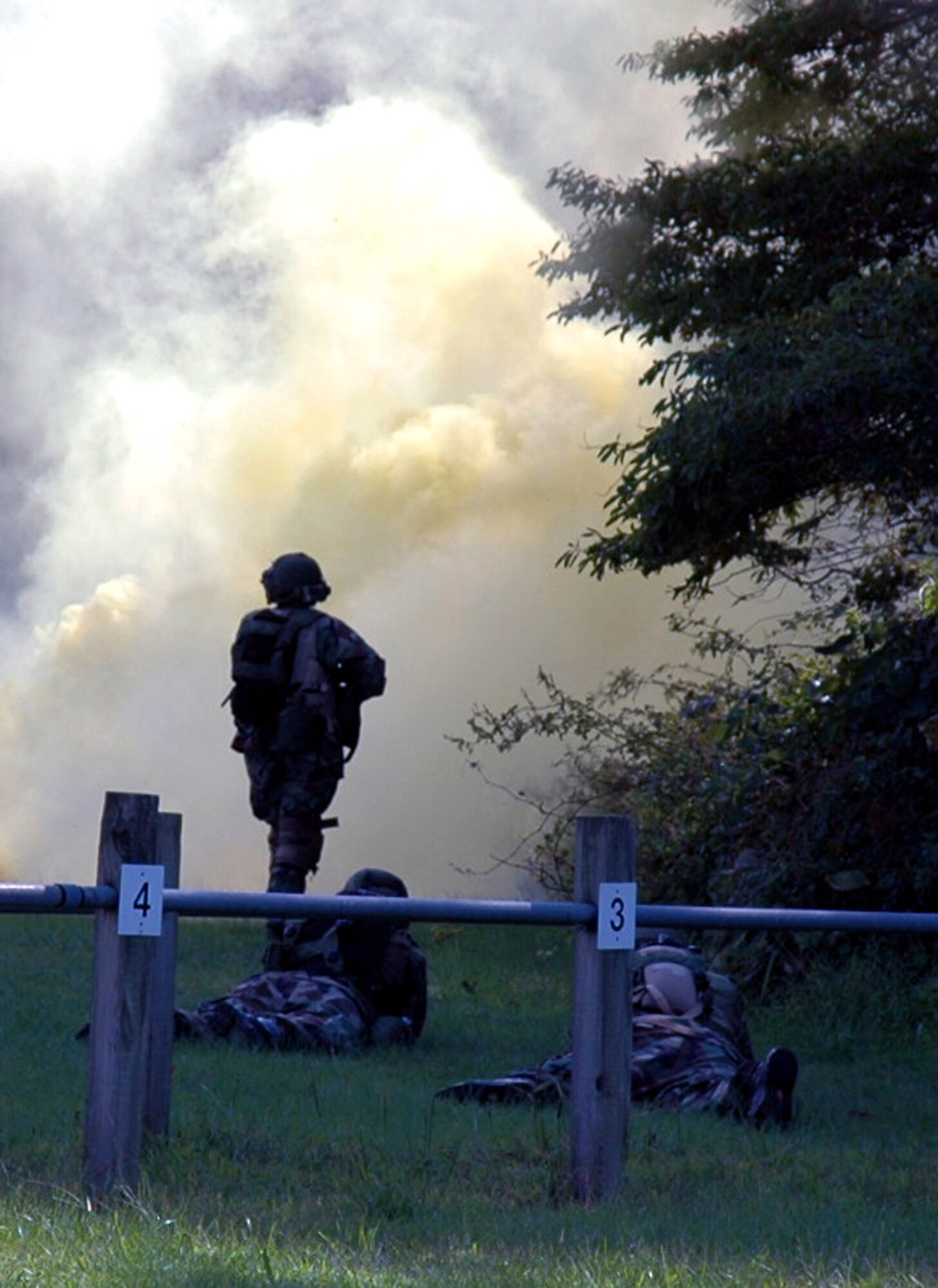 Students in the Air Mobility Warfare Center's Advanced Contingency Skills Training Course 06-5 at Fort Dix, N.J., practice combat patrolling during a training session at a tactical range there Sept. 18. More than 60 Airmen are participating in the training course, learning numerous combat-related skills including tactics, media skills, convoy operations, first aid, and field craft. The course is taught by the AMWC's 421st Combat Training Squadron.  (U.S. Air Force photo/Tech. Sgt. Scott T. Sturkol)