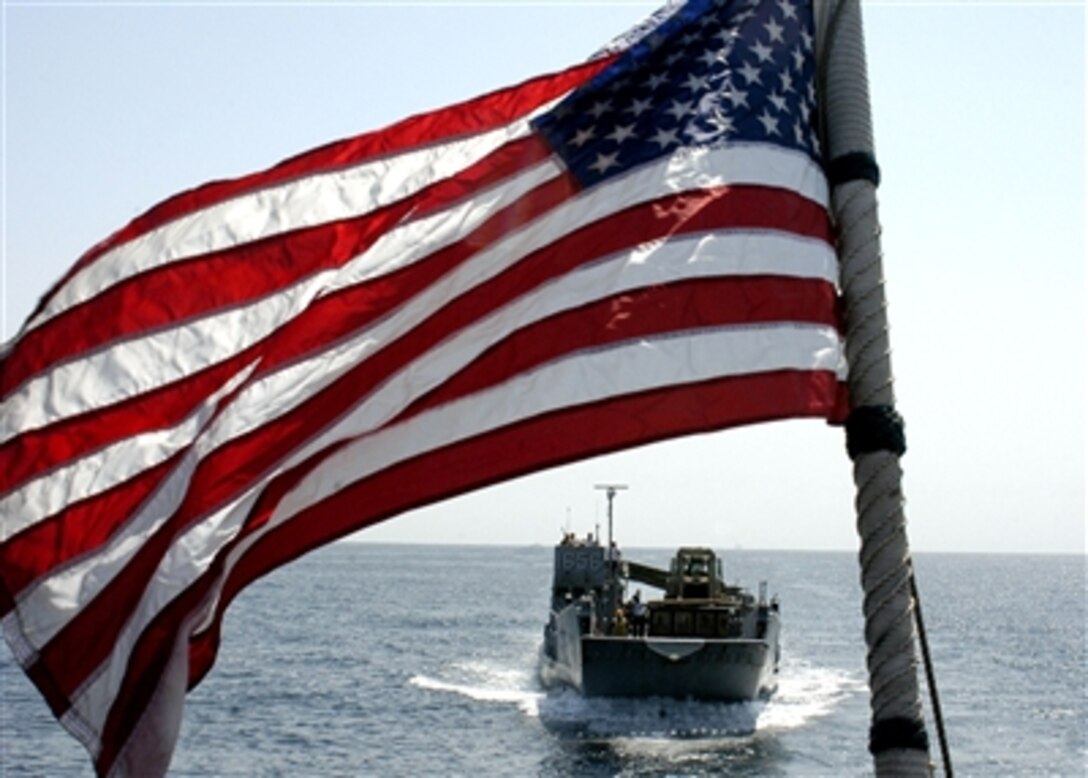 Landing Craft Utility 1656 assigned to Assault Craft Unit 2 approaches Landing Craft Utility 1658 during a maneuvering exercise in the Persian Gulf, Sept. 16, 2006. 