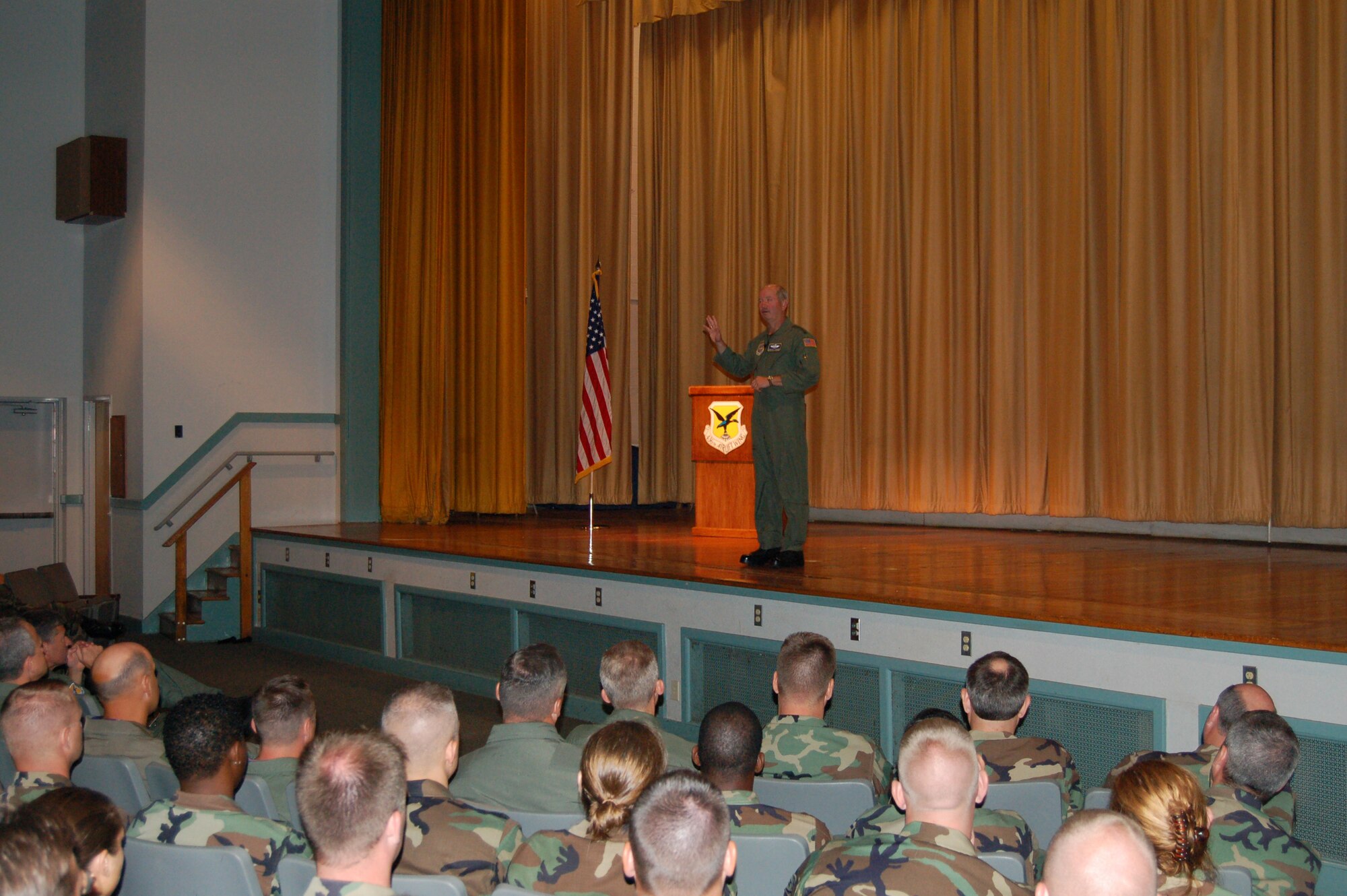 Gen. Duncan McNabb, Air Mobility Command commander, speaks with members of the Eagle and Liberty Wings during a base-wide commander's call at the Base Theater Monday. The general arrived at Dover Air Force Base Sept. 15 and left Tuesday, heading for Andrews Air Force Base to continue his base tours across AMC. The general spoke candidly to Airmen saying, "You are the hearts of our families, but collectively, you are the heart of our Nation." (U.S. Air Force photo/Staff Sgt. James Wilkinson)