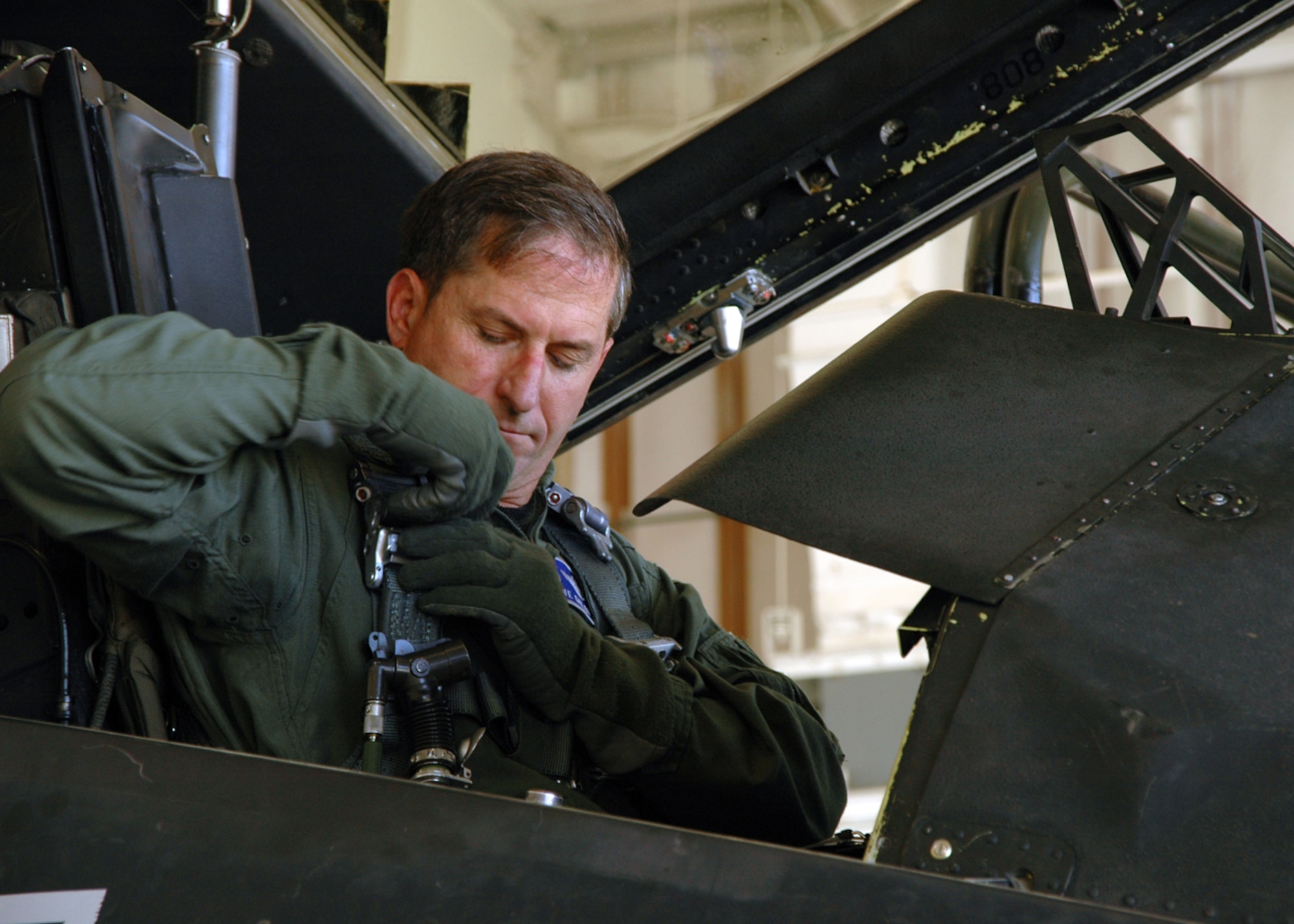 Colonel David Goldfein, commander, 49th Fighter Wing, removes equipment after a successful flight on the F-117A on September 14, 2006, Holloman Air Force Base, New Mexico. This was Col. Goldfein's first flight of the F-117 since assuming command at Holloman. US Air Force photo by Airman Jamal Sutter 