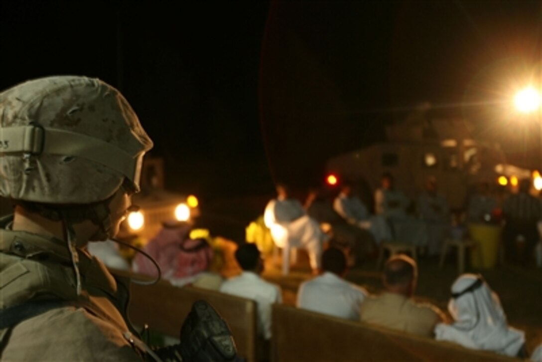 A Marine stands guard near the site of the Marine Battalion