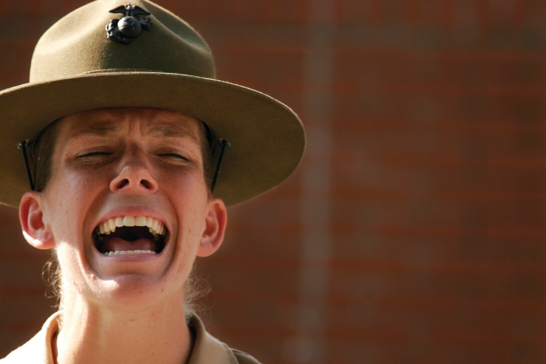 MARINE CORPS RECRUIT DEPOT PARRIS ISLAND, S.C. ? Staff Sgt. Tamara Velding shouts ?fall in? in order to form the platoon.  Velding is a drill instructor with November Company, 4th Recruit Training Regiment.