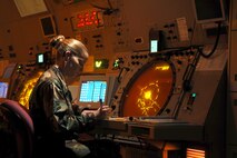 MINOT AIR FORCE BASE, N.D. – Airman 1st Class Laura Washer, 5th Operations Support Squadron Radar and Approach Control Air Traffic Controller, monitors the movement of approaching air traffic to the Minot area Sept. 22.  Airman Washer and the other ATCs at Minot’s Radar and Approach Control are responsible for the safe and on time operations of nearly 18,000 aircraft per-year and control 4,800 square miles of North Dakota air space. This small team of dedicated professionals is not only responsible for Minot’s B-52H Stratofortress air traffic. The ATC also control the approaching aircraft of the local Minot International Airport. (U.S. Air Force photo by Staff Sgt. Joe Laws)