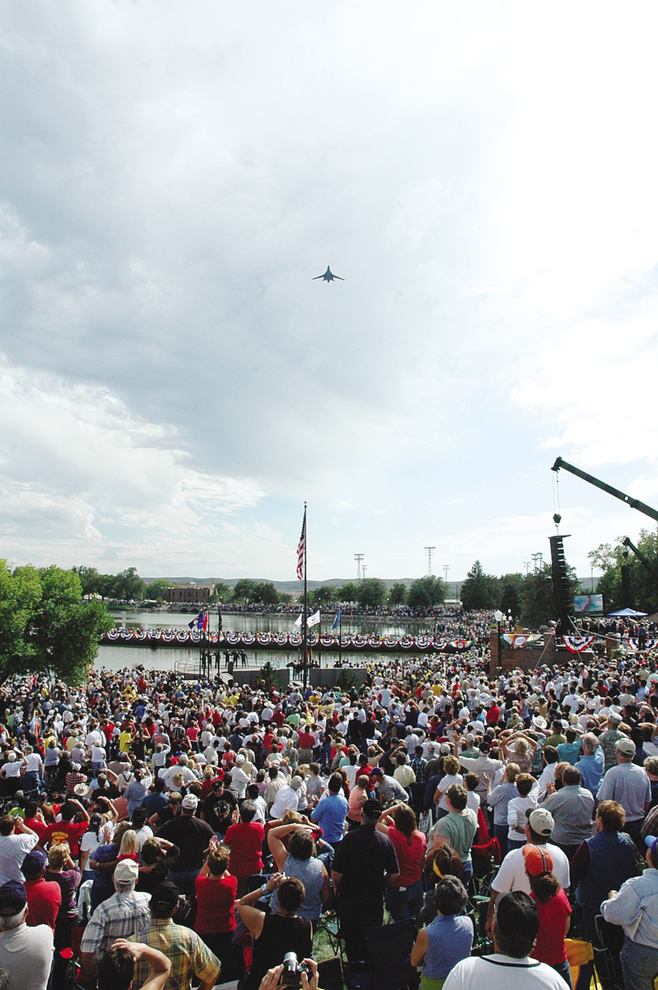 An Ellsworth B-1 flies over the state capitol grounds during the South Dakota Vietnam War Memorial Dedication Ceremony Sept. 16. The ceremony, attended by more than 32,000 was a tribute to the Vietnam War veterans and their families. Many in attendance expressed their satisfaction of the dedication, "A ceremony like this is way past due for our veterans," said Shary Haag, Rapid City resident and niece of Thurman Blackbird a Vietnam veteran. "(The organizers) did a wonderful job; it was a great dedication." For more about the memorials, go to www.sdvietnamwarmemorial.com. (Photo by 1st Lt. Carrie L. Kessler)