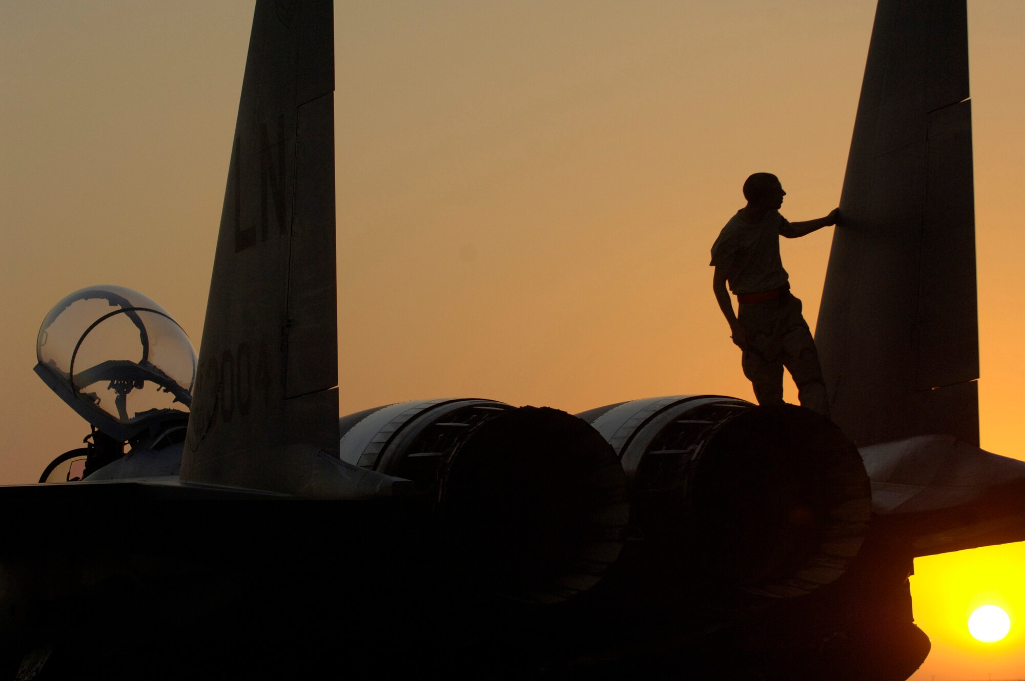 Airman 1st Class Kevin Romer performs a post-flight inspection an F-15E Strike Eagle at a forward-deployed base in Southwest Asia Sept. 21. Airman Romer is an F-15E crew chief assigned to the 494th Aircraft Maintenance Unit. (U.S. Air Force photo/Master Sgt. Scott Wagers) 
