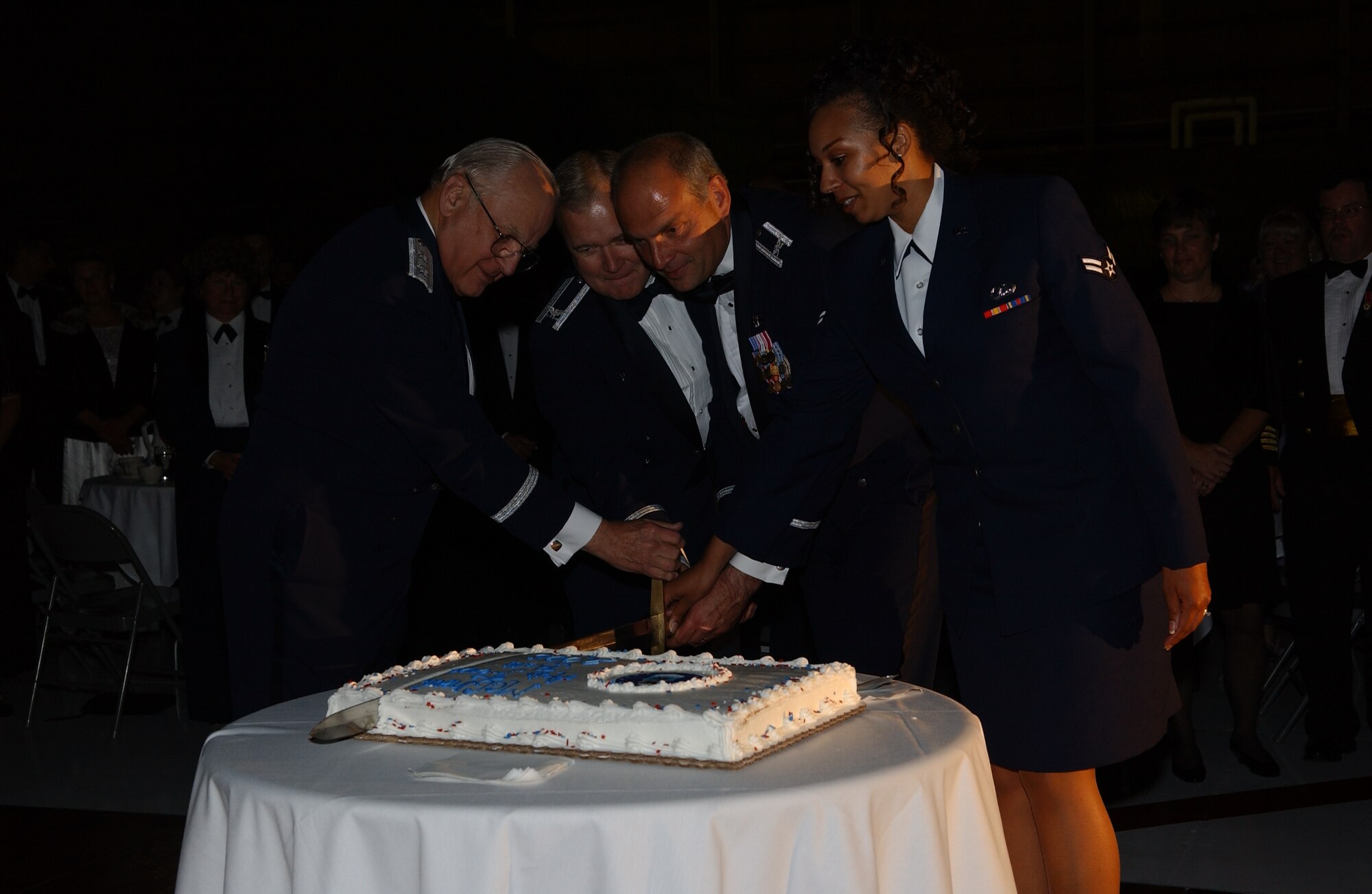 MCCHORD AIR FORCE BASE, Wash. — From left, General Brown, Col. James Weber, 62nd Maintenance Group commander; Col. Shane Hershman, 62nd Airlift Wing vice commander; and Airman 1st Class Leona Handfield, 62nd AW, cut the cake during the Air Force Ball.
(U.S. Air Force photos/Abner Guzman)
