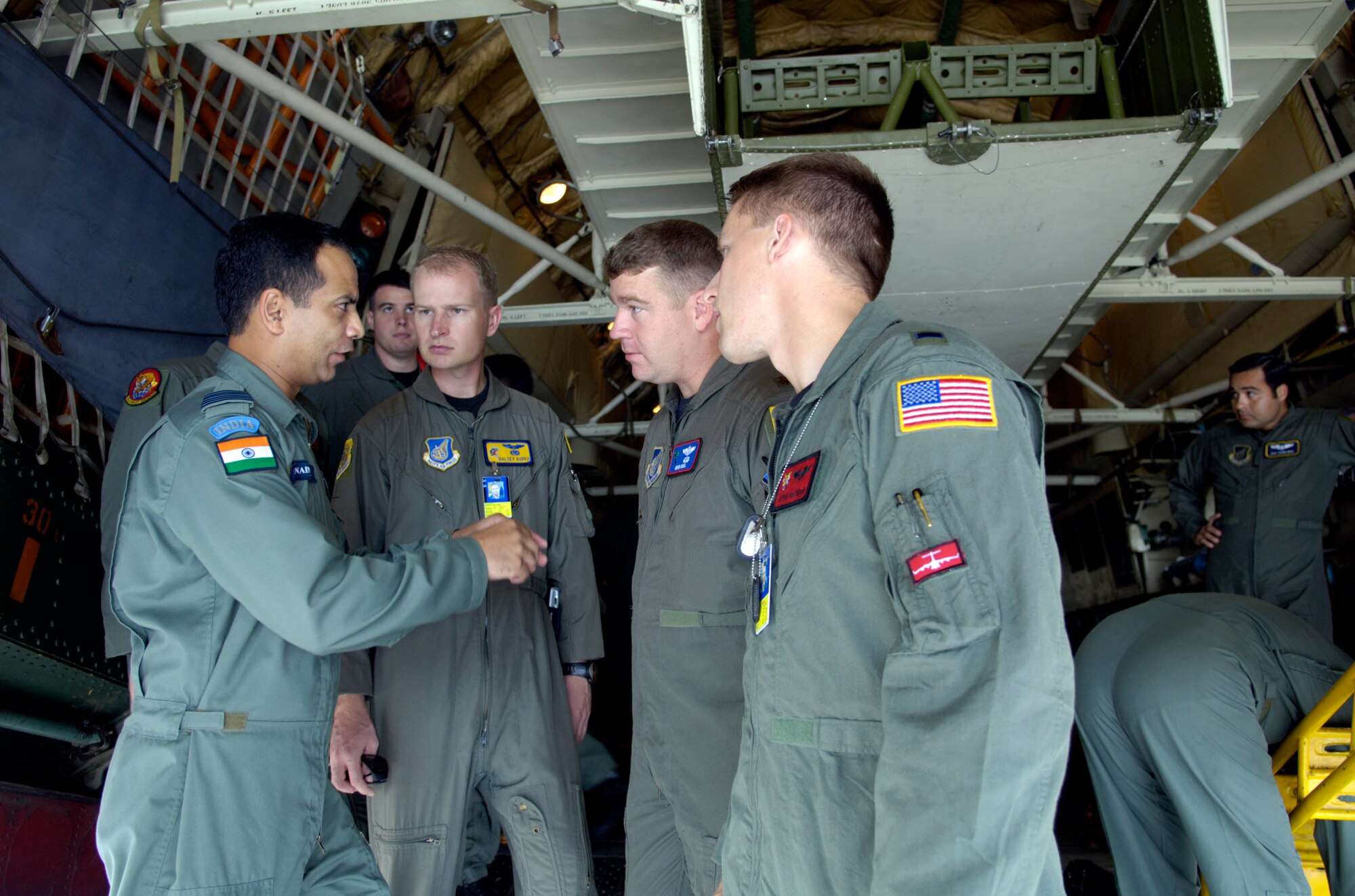 Wing Commander P. Naiwal talks about the capabilities of the IL-76 medium cargo jet to members of the 15th Airlift Wing at Hickam Air Force Base, Hawaii. Sept. 20, 2006. Wing Commander Naiwal is a pilot with the Indian Air Force. The Indian Air Force is flying members of the 15th Airlift Wing to show their American counter parts what their aircraft is capable of. (U.S. Air Force photo/ Tech. Sgt. Shane A. Cuomo)
