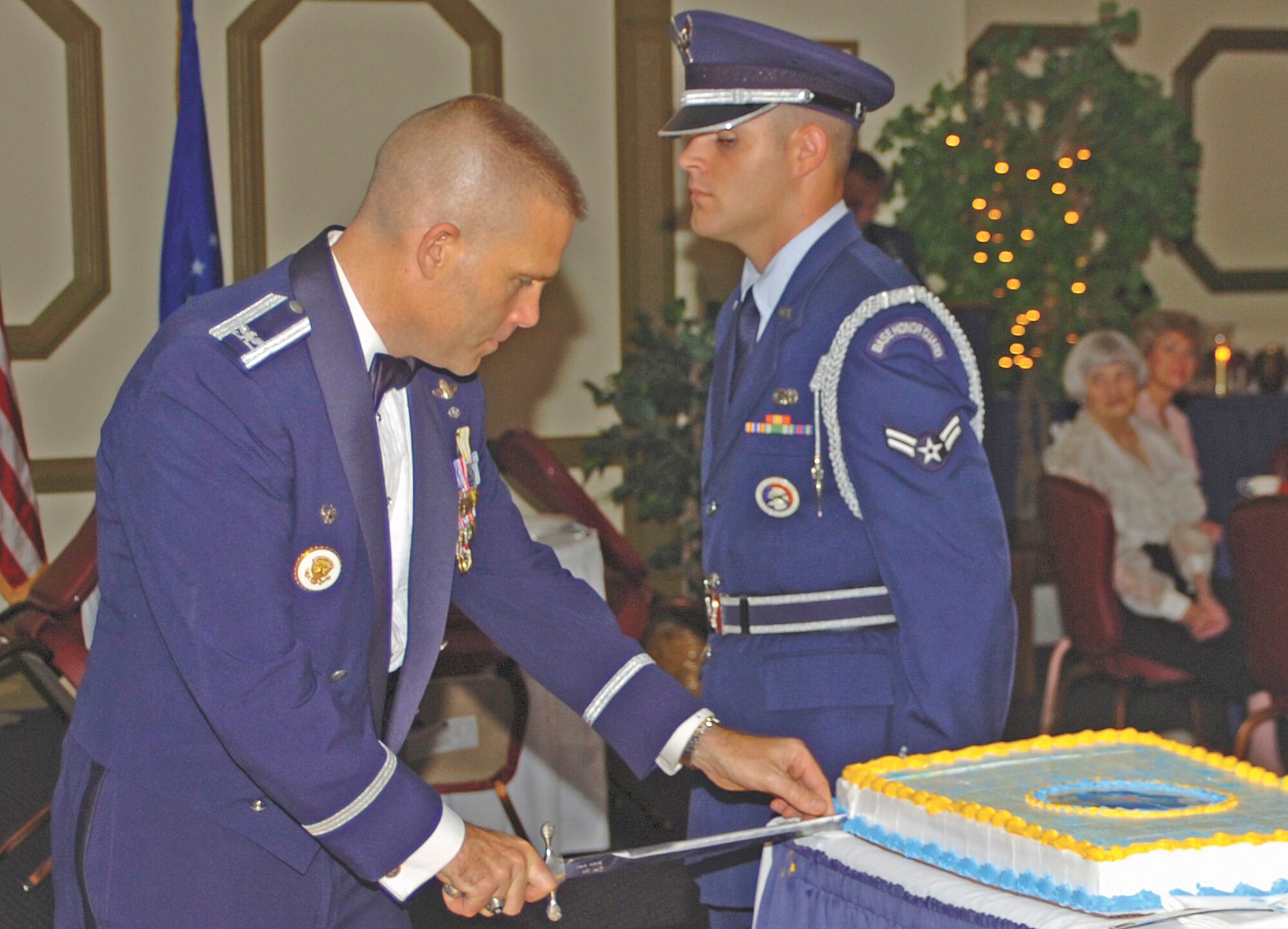 Colonel Steve Kwast, 4th Fighter Wing commander, cuts the cake at the Air Force Ball Saturday at the enlisted club.
The ball celebrated the 50th anniversary of Seymour and the 59th birthday of the Air Force.