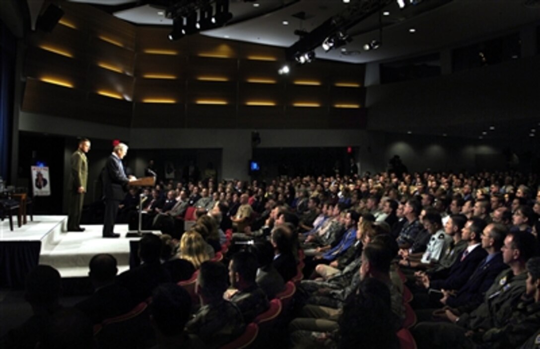 Secretary of Defense Donald H. Rumsfeld and  Chairman of the Joint Chiefs of Staff Marine Gen. Peter Pace respond to questions from military and Department of Defense civilians during a town hall at the Pentagon, Sept. 22, 2006. 