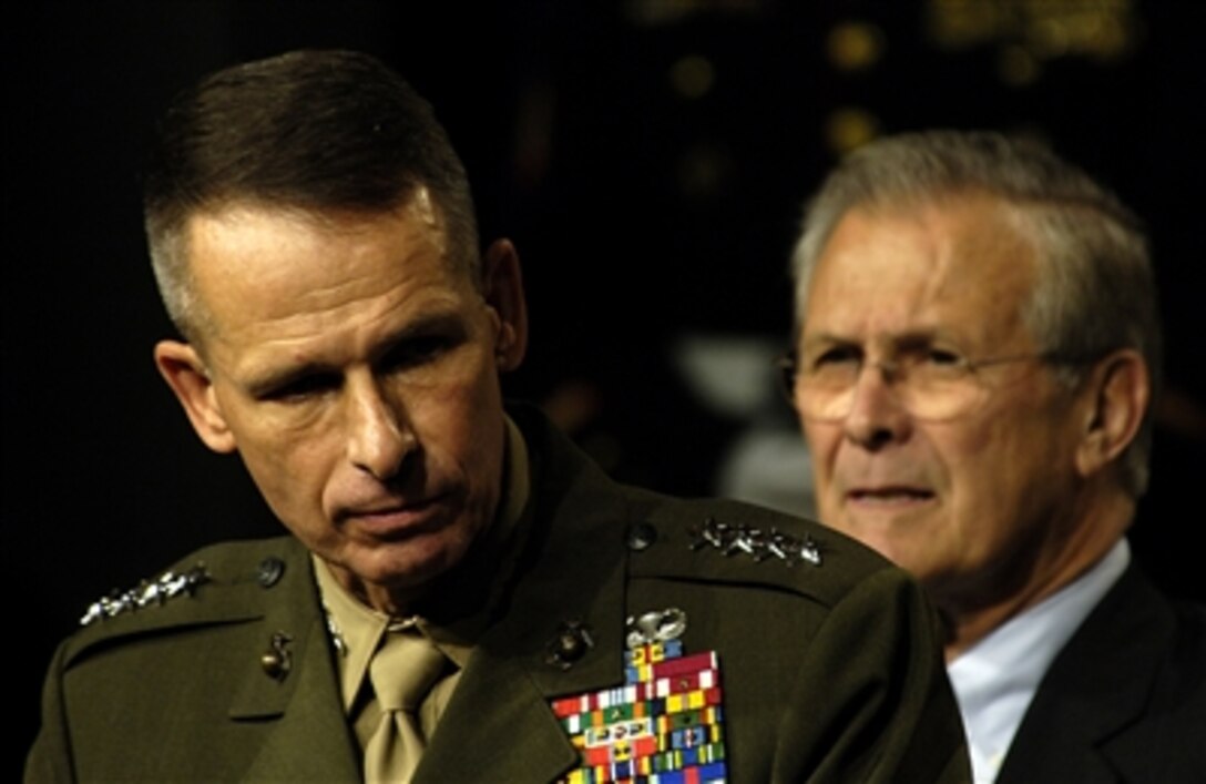 Chairman of the Joint Chiefs of Staff Marine Gen. Peter Pace addresses an audience of military and DOD civilians during a town hall at the Pentagon, Sept. 22, 2006. Pace was joined by Secretary of Defense Donald H. Rumsfeld.