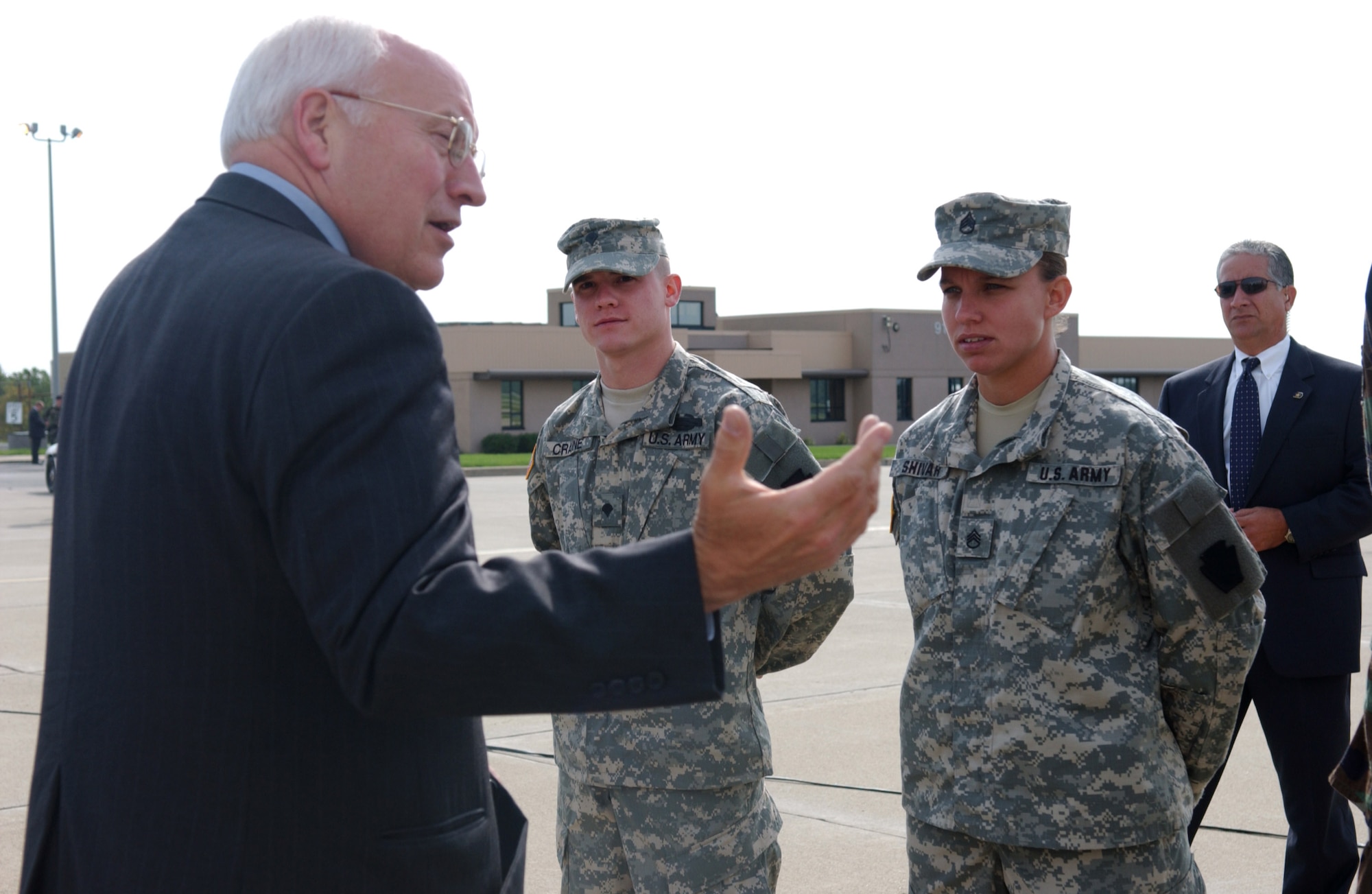 Vice President Dick Cheney speaks to Spc. Mike Craine and Staff Sgt. Nicole Shiver Sept. 22. The vice president visited Pittsburgh and thanked six men and women of the Pennsylvania Air National Guard (171st Air Refueling Wing and the 258th Air Traffic Control Squadron) and two members of the Pennsylvania Army National Guard for their service in Iraq and Afghanistan.  (U.S. Air Force photo/Master Sgt. Mark Winkloski)