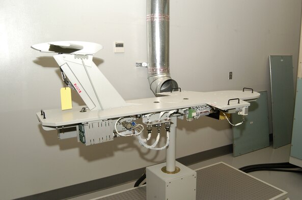 A full-scale model of a C-5 Galaxy cockpit, called a combined avionics systems trainer, or CAST, will be used by instructors at Dover Air Force Base, Del., to help train maintainers who will fix avionics systems on the C-5.  The trainer comprises five separate sections including a forward cockpit station, navigator station, an aircraft silhouette, an avionics station and an instructor station.  The silhouette station, shown here, emulates the movement of C-5 flight control surfaces such as ailerons, elevators and the rudder.  (U.S. Air Force photo/Senior Airman James Bolinger)