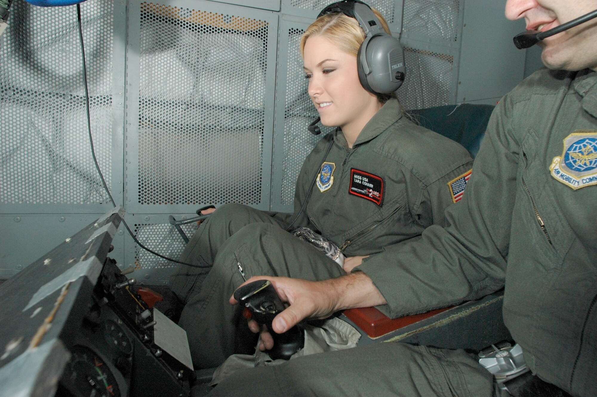 Miss USA 2006 Tara Connor, operates a KC-10 boom Sept. 14 with the help of Master Sgt. Shawn Lamb, 2nd Air Refueling Squadron boom operator. Photo by Kenn Mann