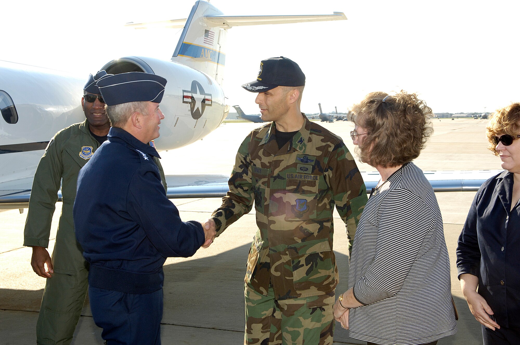 Gen. Duncan J. McNabb, Air Mobility Command commander, is greeted by Col. Bill Spacy, 305th Air Mobility Wing vice commander, and Barbara Martin, wife of Col. Rick Martin, 305th AMW commander, here Wednesday. General McNabb will be the guest speaker at the Air Force birthday celebration at McGuire Saturday. Photo by Kenn Mann