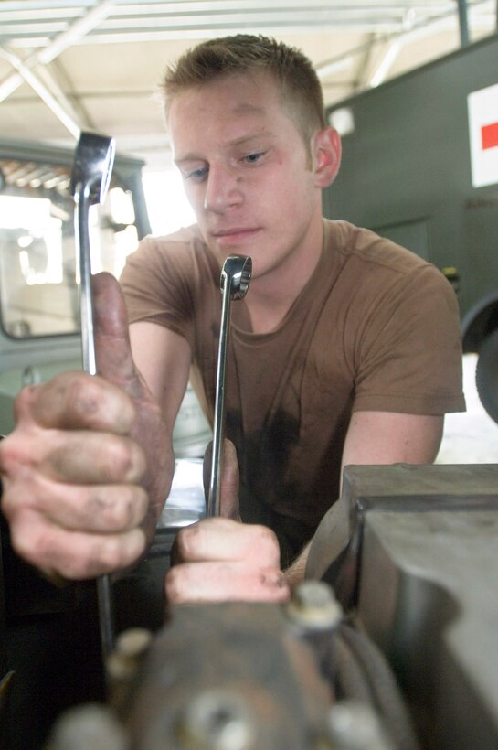 Senior Airman Andrew Henderson completes a periodic maintenance inspection on a forklift Sept. 20 at Sembach Air Base, Germany, ensuring it's ready for immediate worldwide deployment. Airman Henderson is a vehicle and vehicular equipment specialist with Sembach's 435th Materiel Maintenance Squadron. (U.S. Air Force photo/Master Sgt. John E. Lasky) 